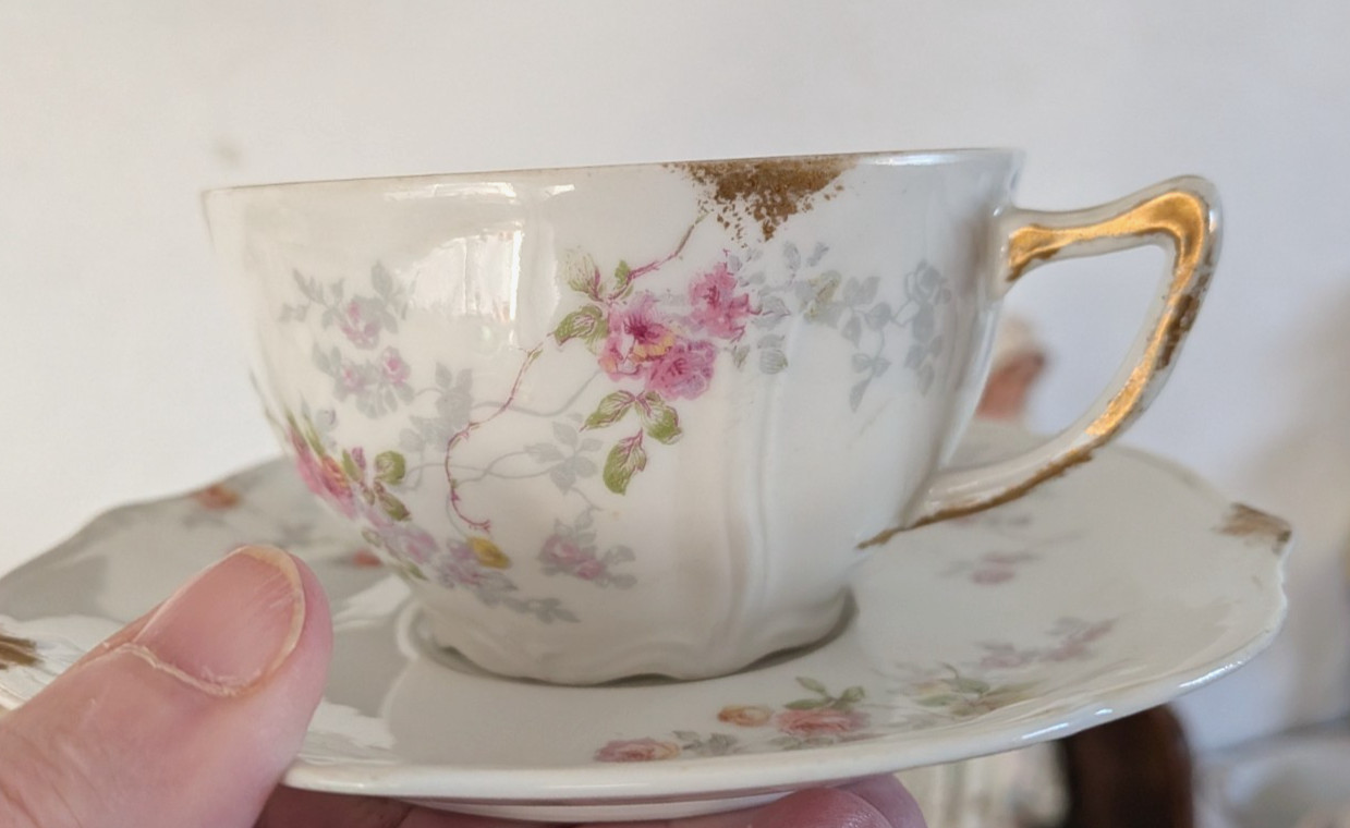 Rare C. Ahrenfeldt Limoges porcelain teacup and saucer