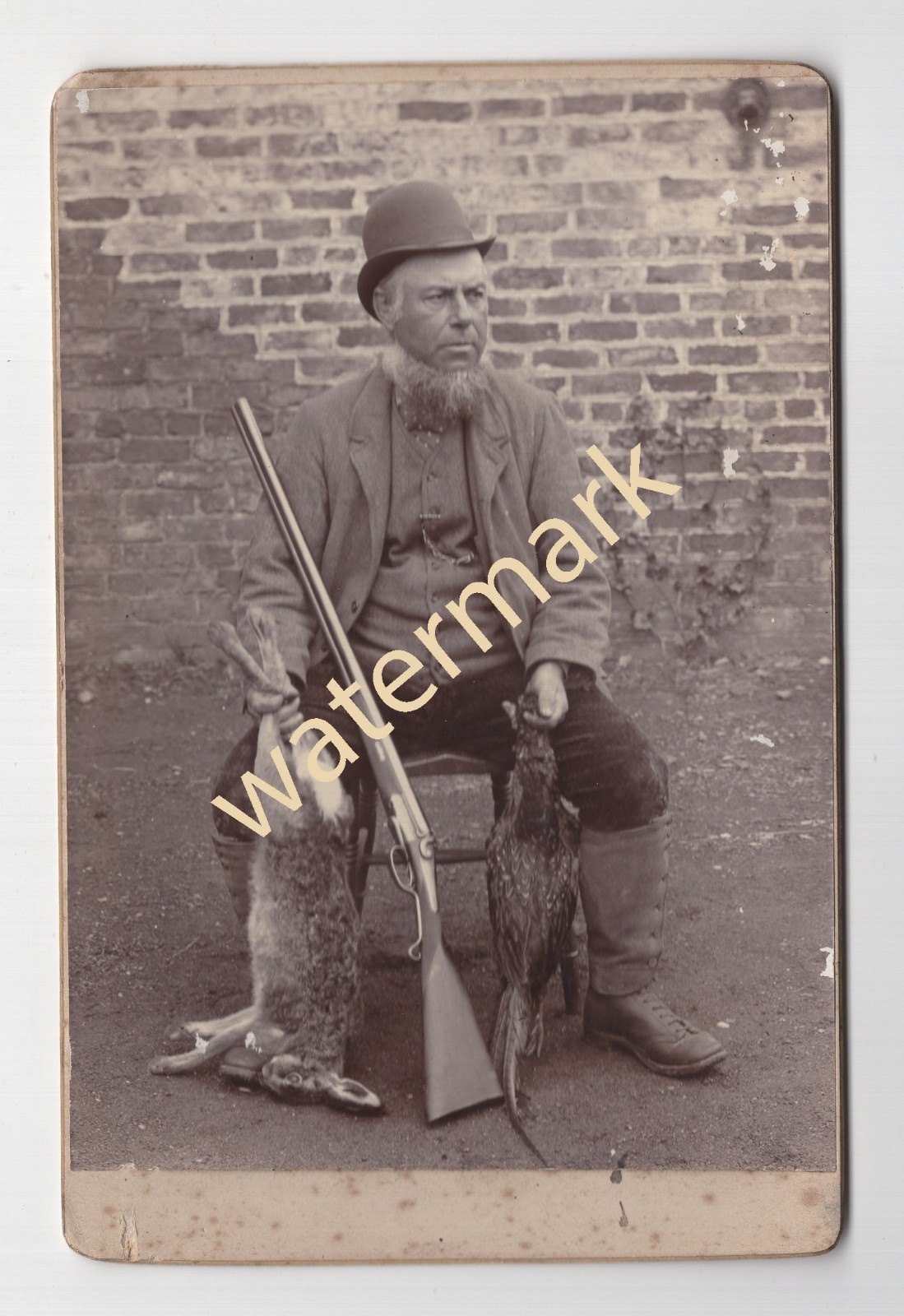 Hunter with shotgun and game, Cabinet photo