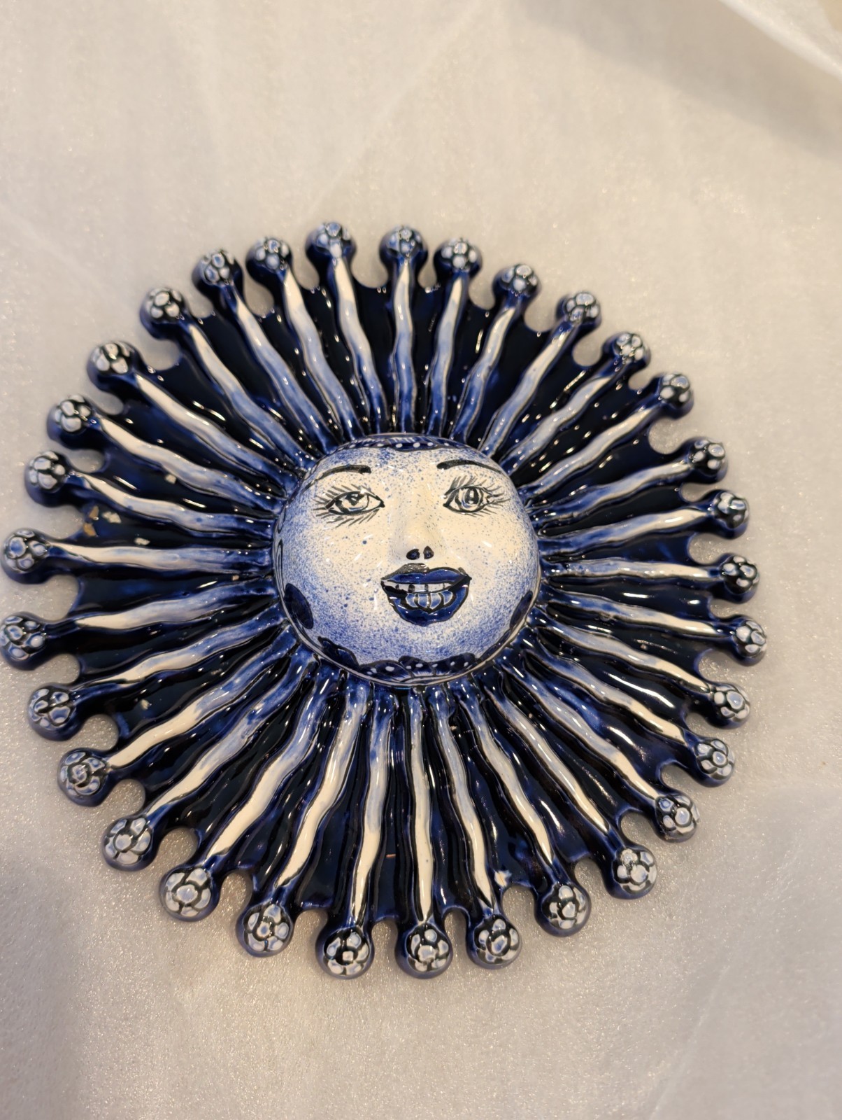 Talavera sun face, Alambre Mexican artist Gerardo Garcia 