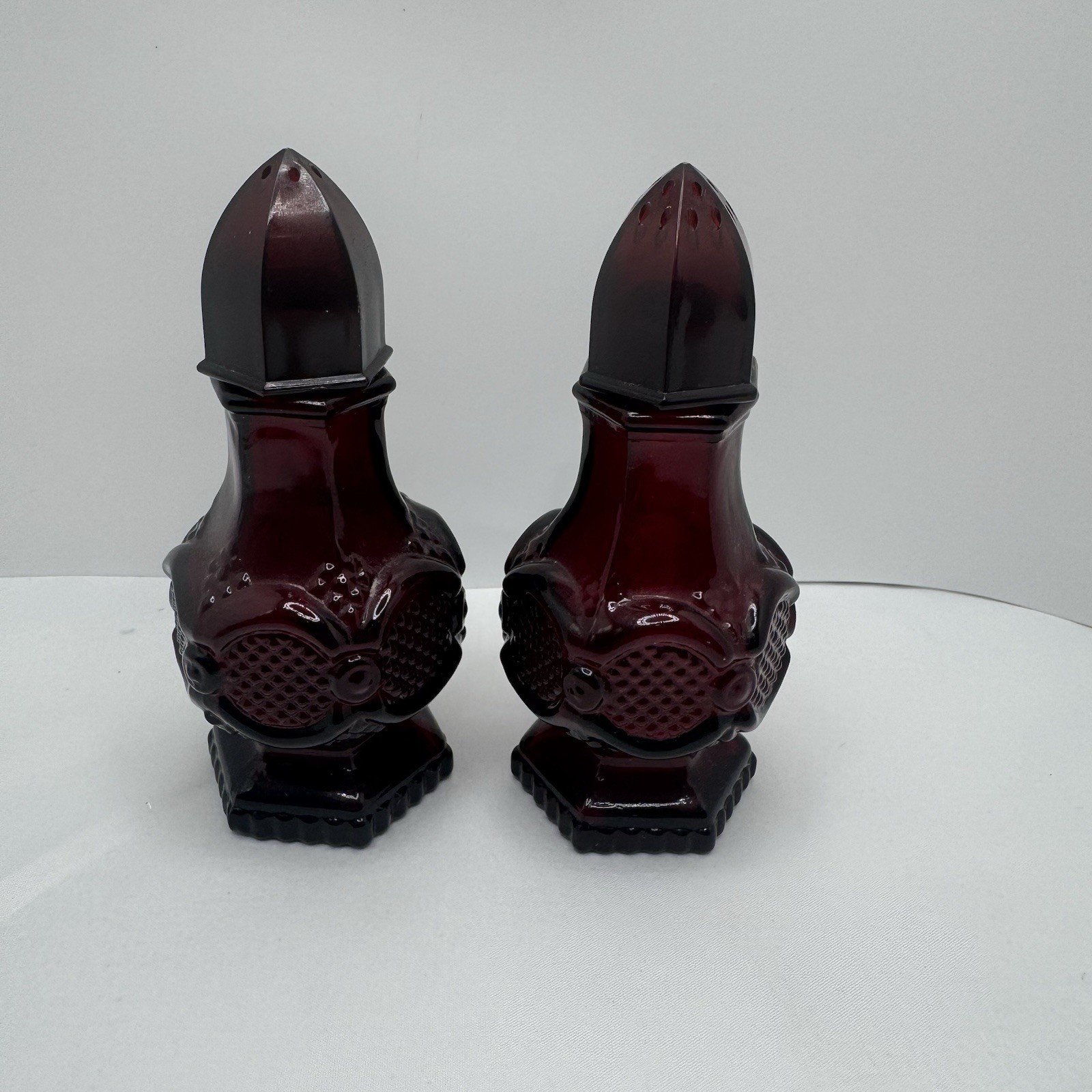 Avon 1876 Cape Cod Ruby Red Salt Shaker Cologne Bottles Pair Full Sealed