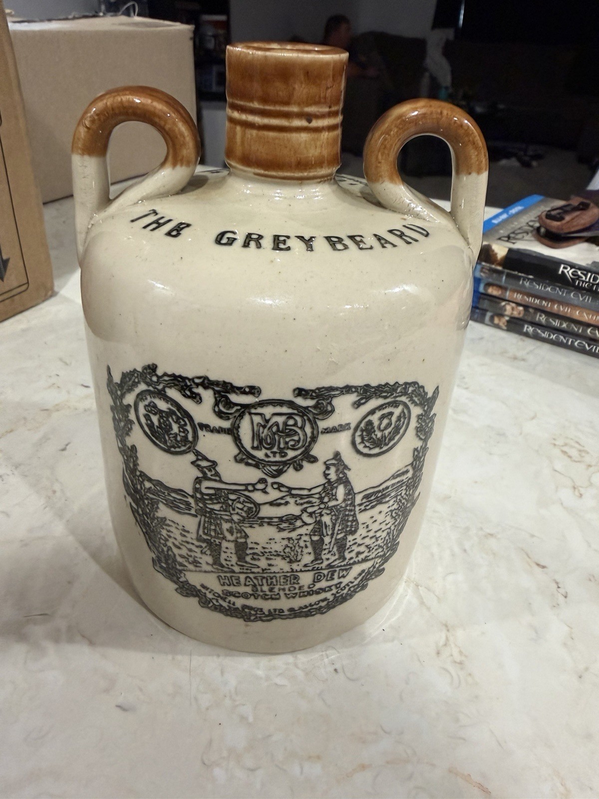 The Greybeard Stoneware Ceramic Distillery Advertising Bottle Jug w/ Handle