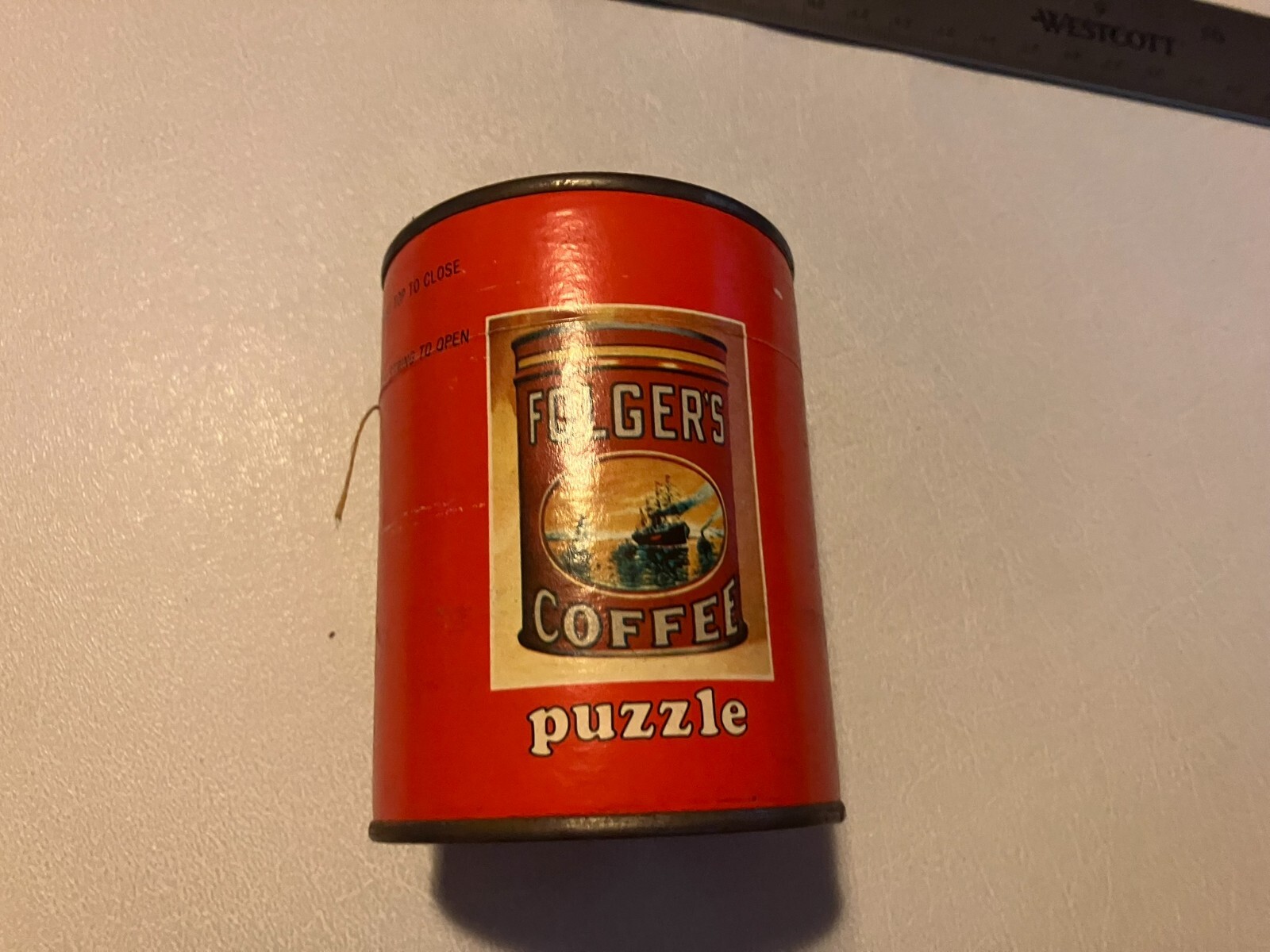 ANTIQUE VINTAGE FOLGERS COFFEE TIN CAN ADVERTISING PUZZLE SEALED