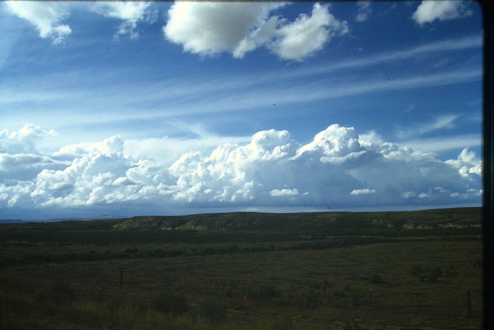 c1960\'s Kodachrome 35mm Slide Western Landscape Cumulus Clouds Blue Sky American