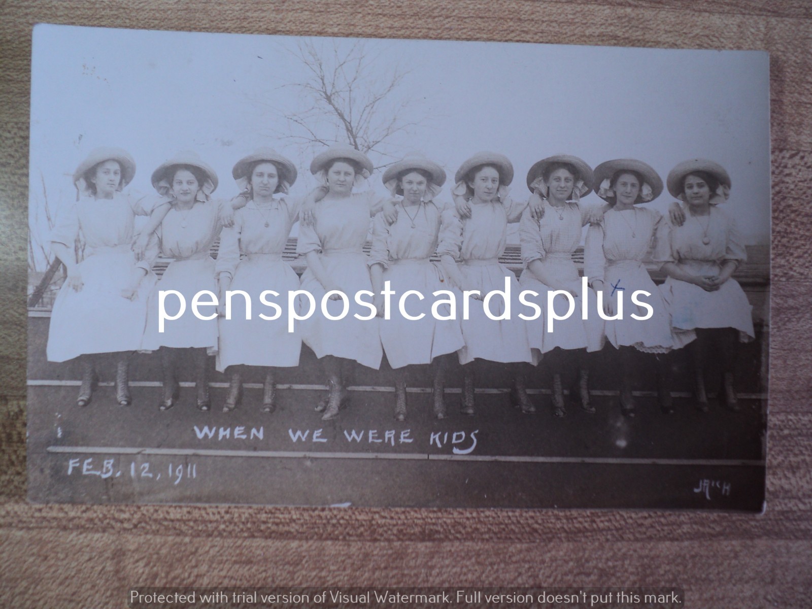 Row of 9 Pretty Young Ladies in Matching Outfits 1911 RPPC Postcard