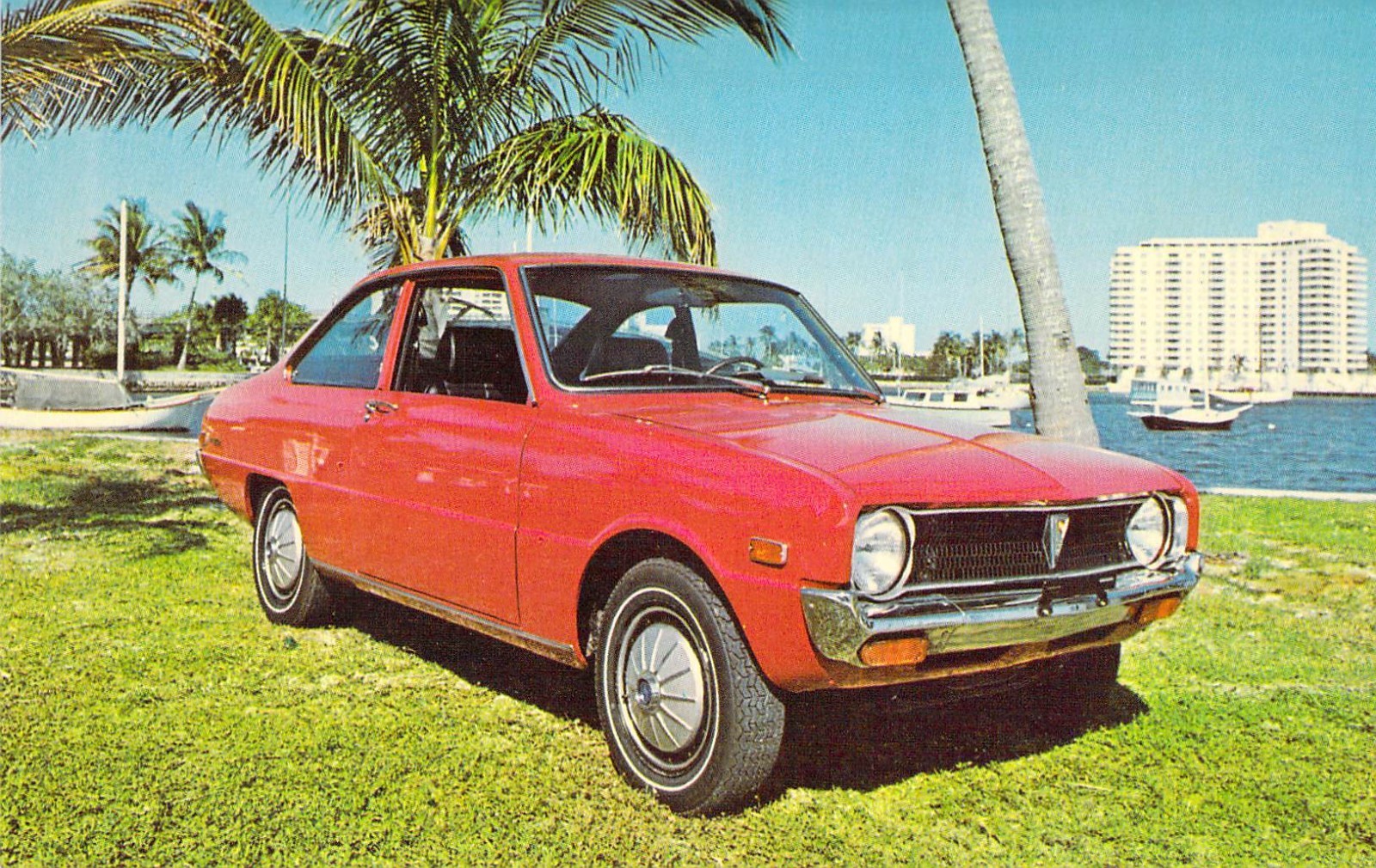 1971 FL Fort Lauderdale Mazda R100 vintage auto Rotary Engine Postcard A90