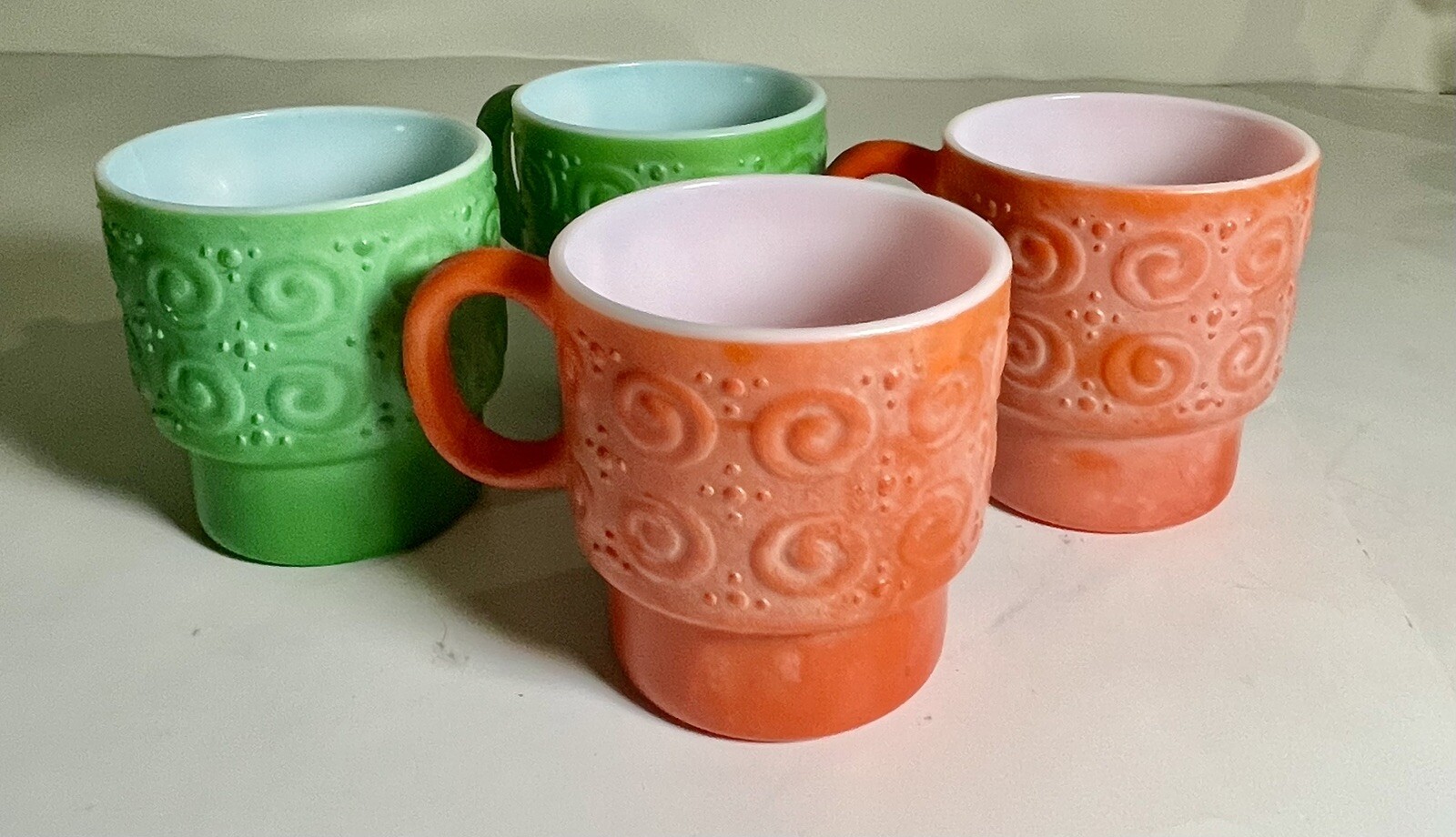 4 VTG Hazel Atlas Embossed Red/Green Stackable Milk Glass Mugs  Some Fading