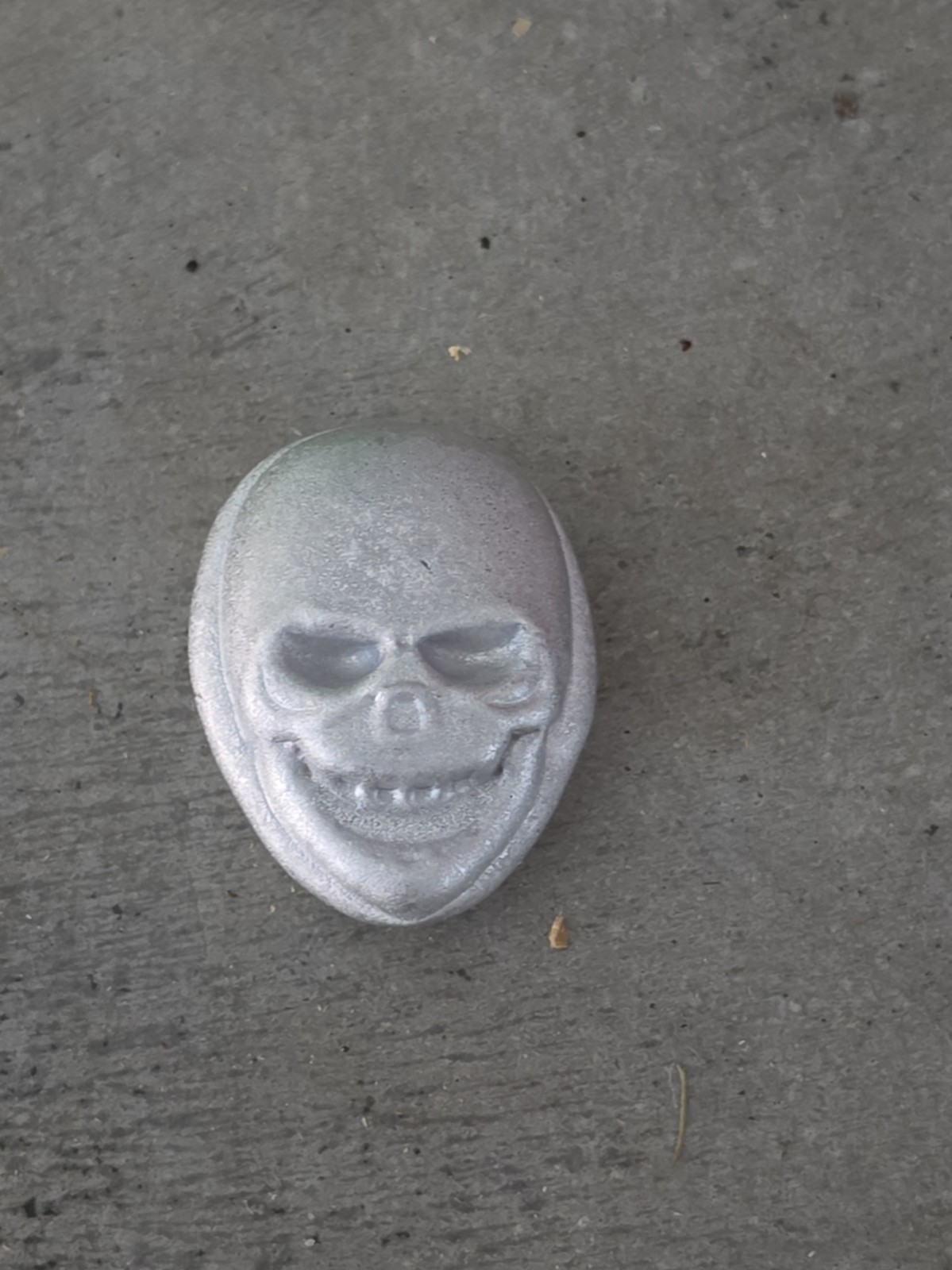 handcrafted solid metal skull medallion