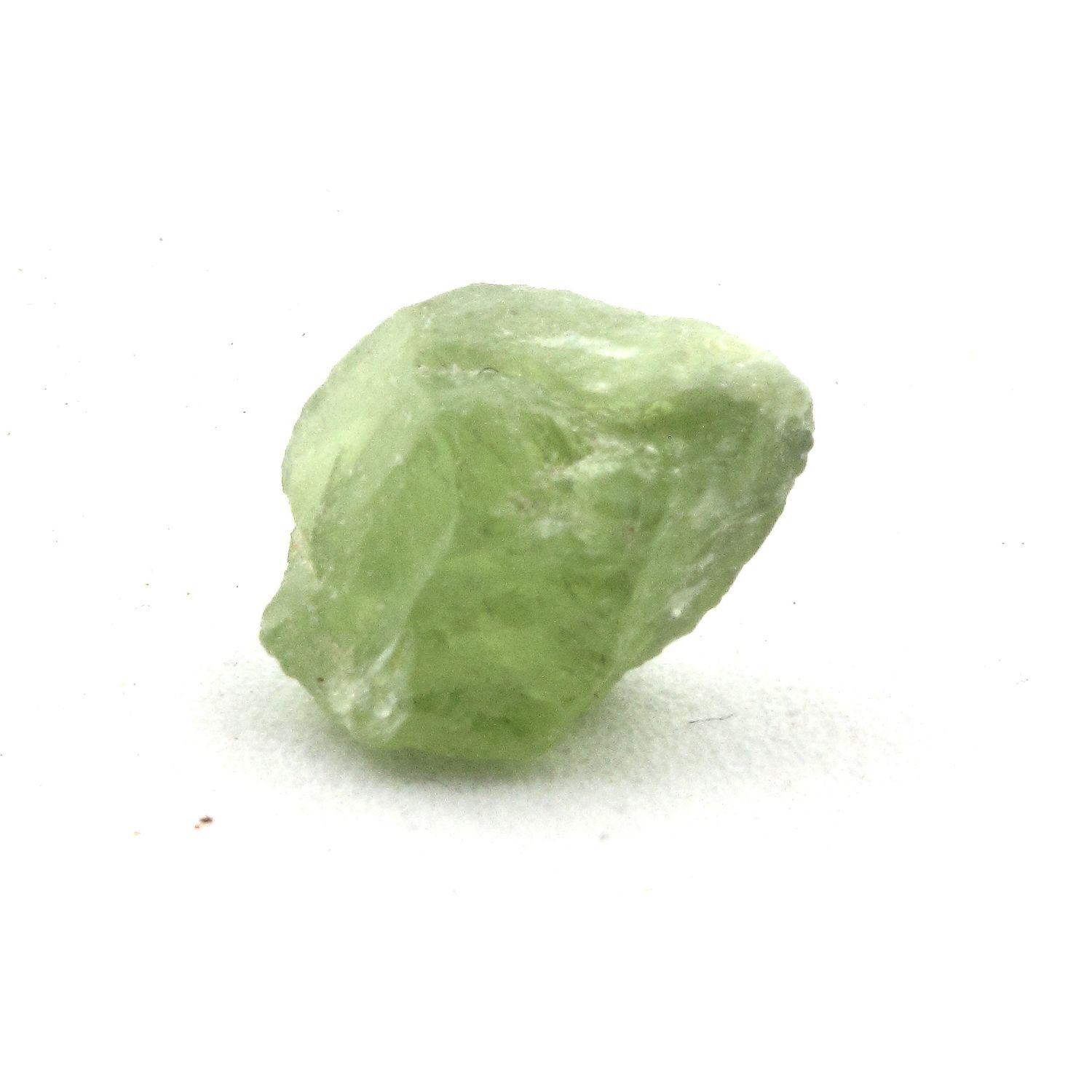 Stones And Minerals. Peridot. 4.07 Ct. Almklovdalen, Vanylven, Norway. Stones And Minerals. Peridot. 4.07 Ct. Almklovdalen, Vanylven, Norway.