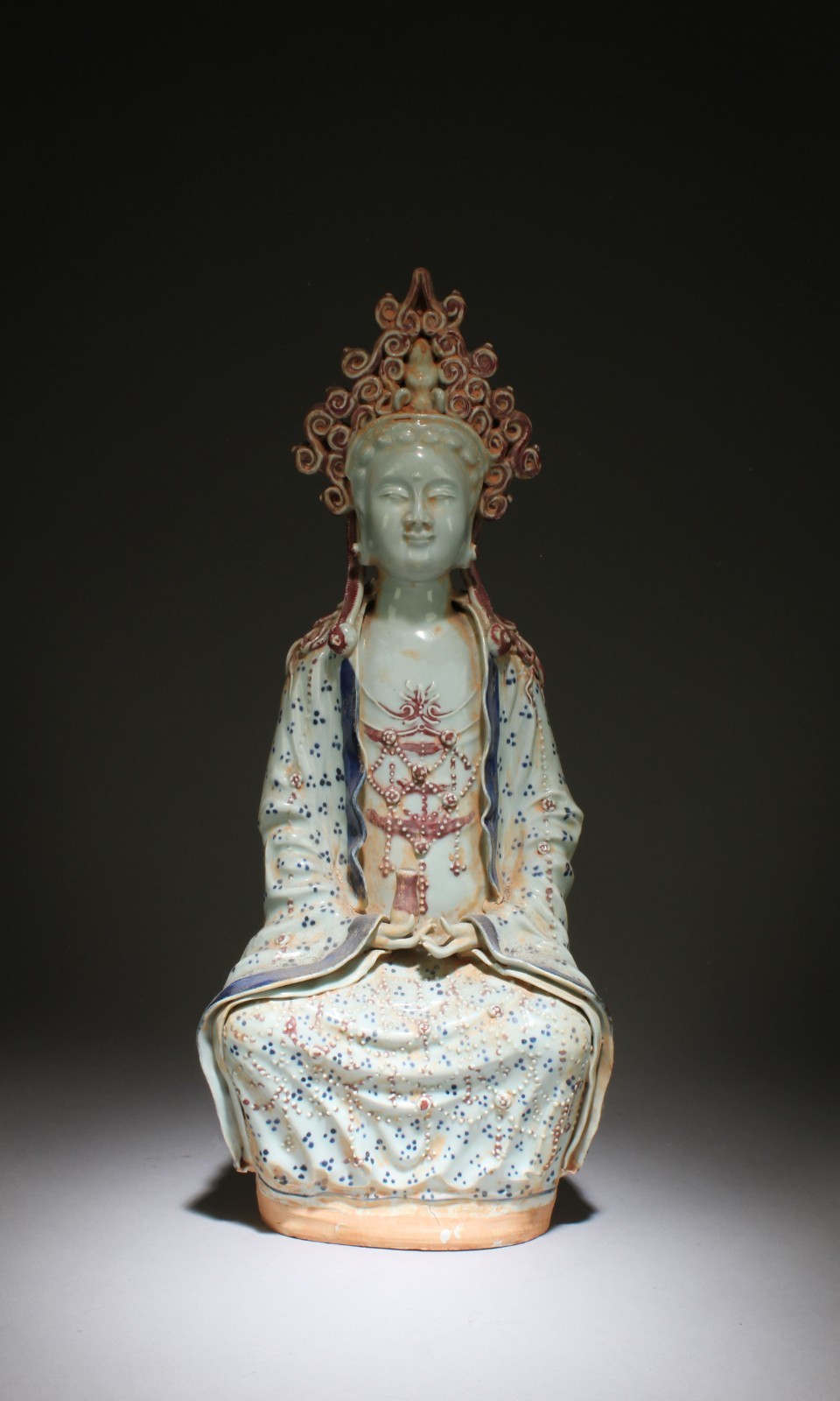 A Porcelain Seated Guanyin A Porcelain Seated Guanyin