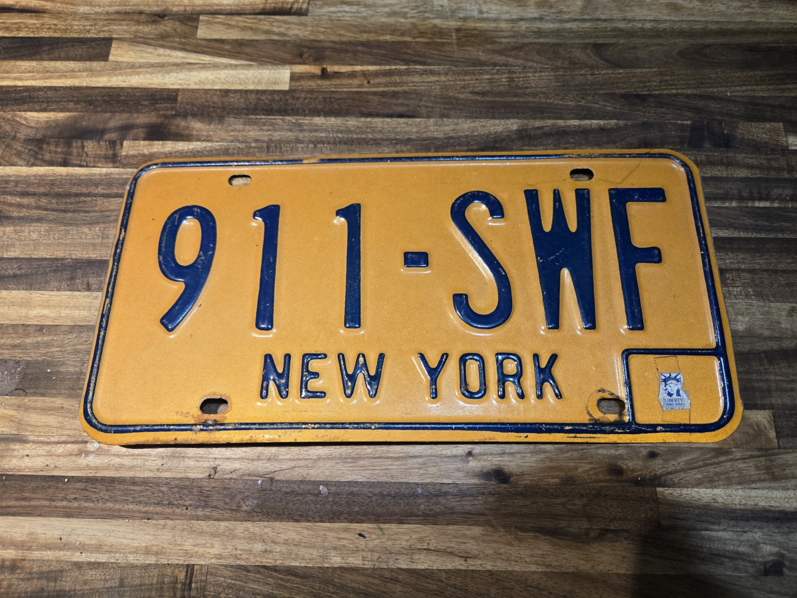 Vintage Orange New York 1973-1986 License Plate 911 Good Condition
