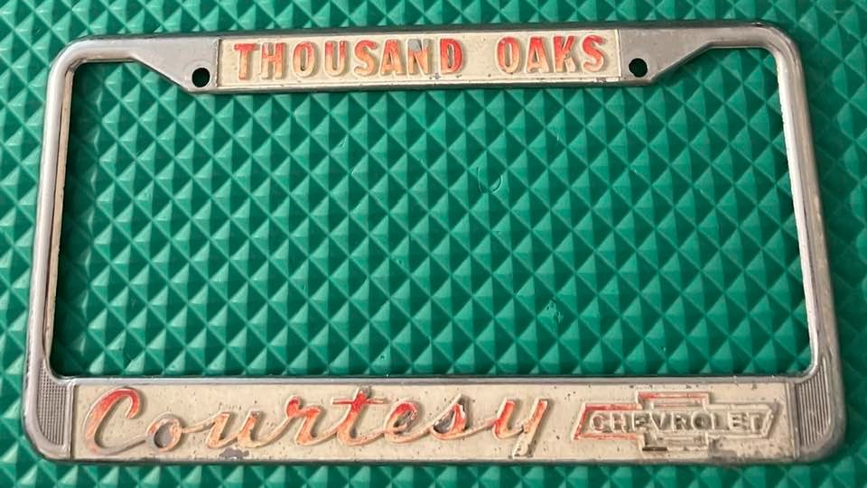 Vintage Courtesy Chevrolet Dealership Booster License Plate Frame Thousand Oaks