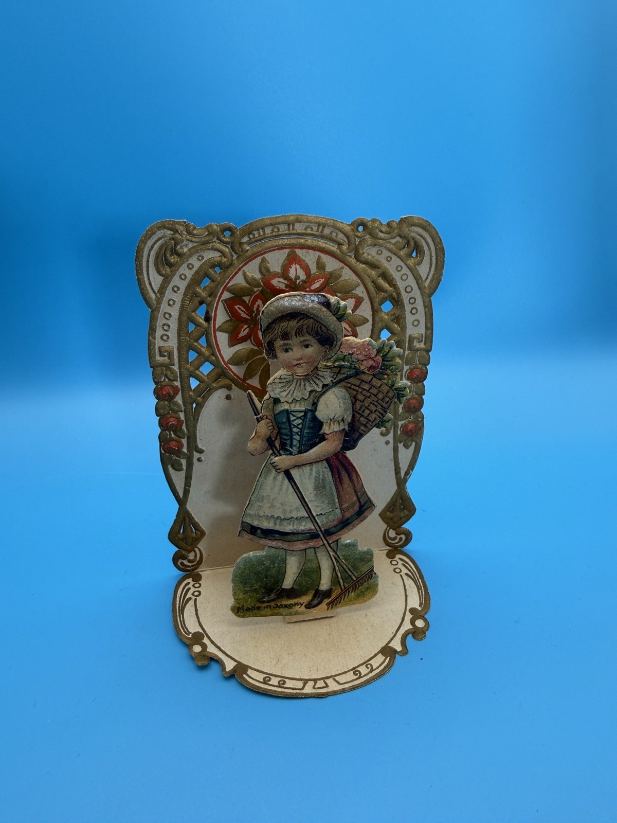 Antique German Stand-Up Valentine Card – Saxony Girl Basket Flowers c. 1905–1915
