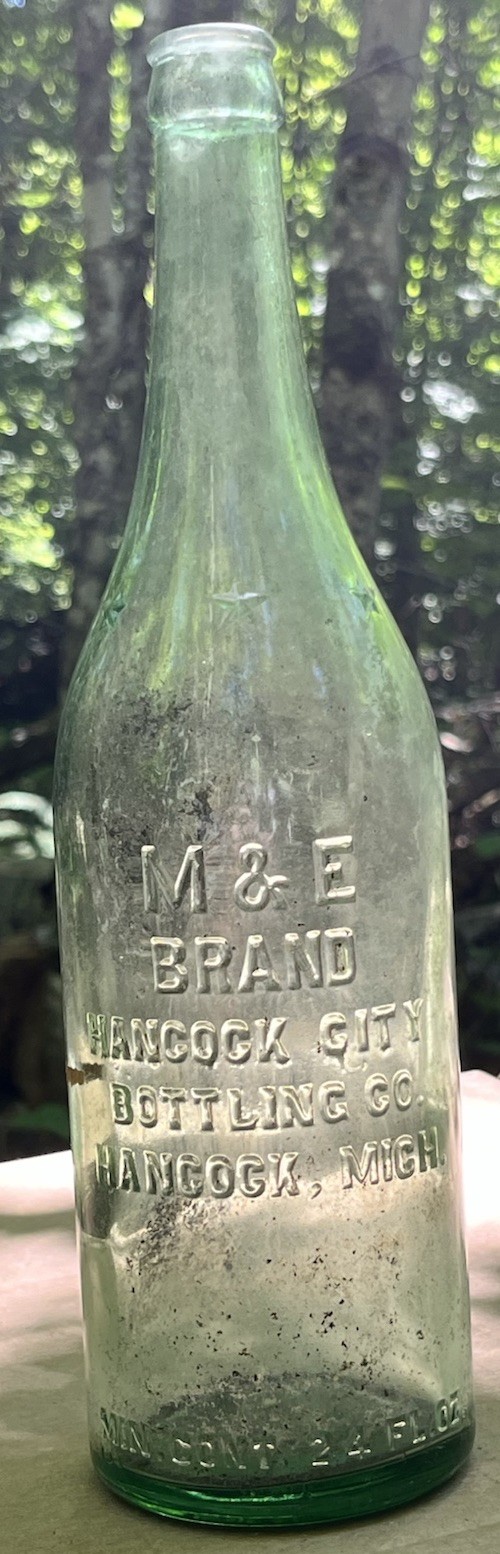 1924 M & E brand hancock michigan glass bottle 24 fl oz  11 3/4