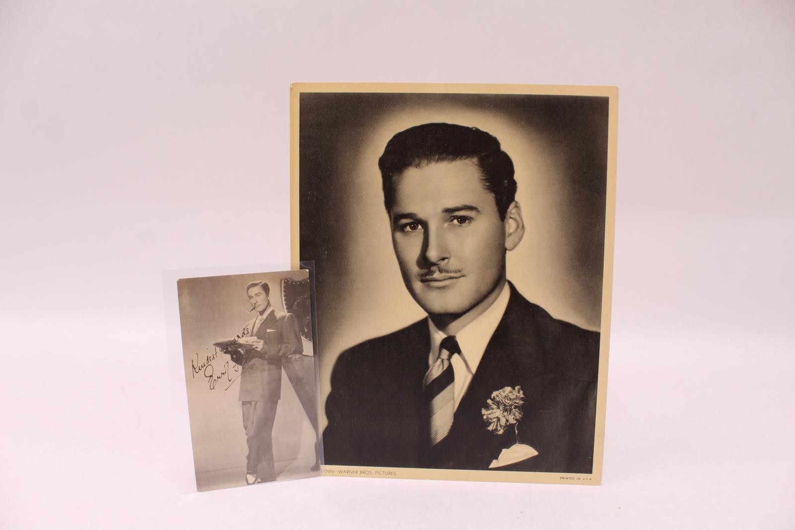 Errol Flynn Signed Photograph and Postcard, Warner Bros. Pictures Errol Flynn Signed Photograph and Postcard, Warner Bros. Pictures