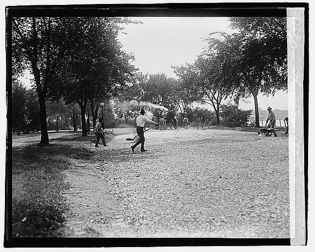 Photo:Barrett G 1920 Fire Hose Drill Park Scene Trees Men