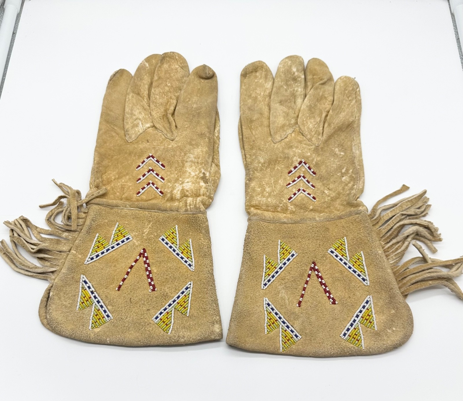 Pair of Northern Plains Indian Beaded Gauntlet gloves Early 20th century