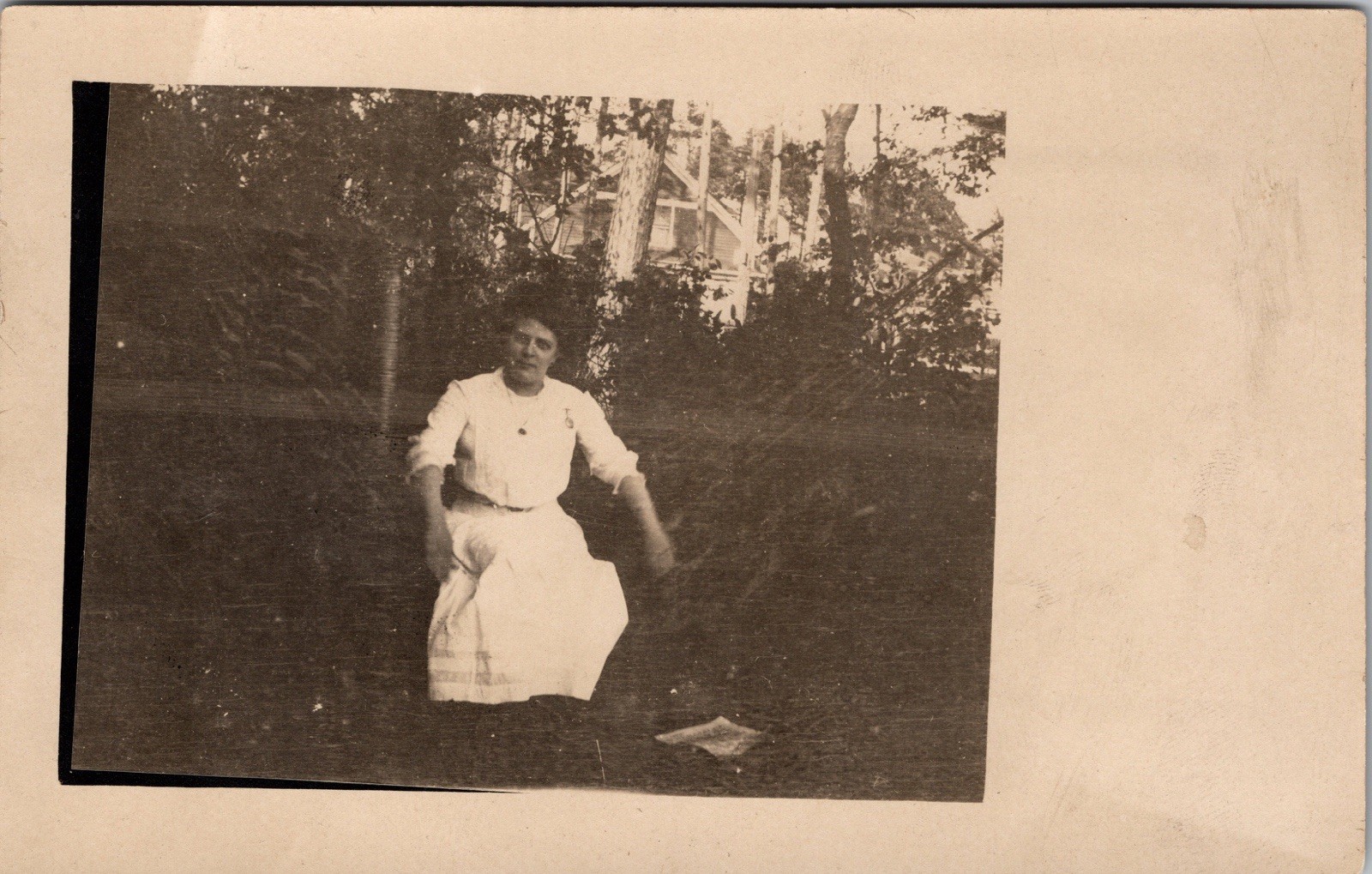 Postcard Real Photo RPPC Woman Sitting in Chair in Yard Unposted