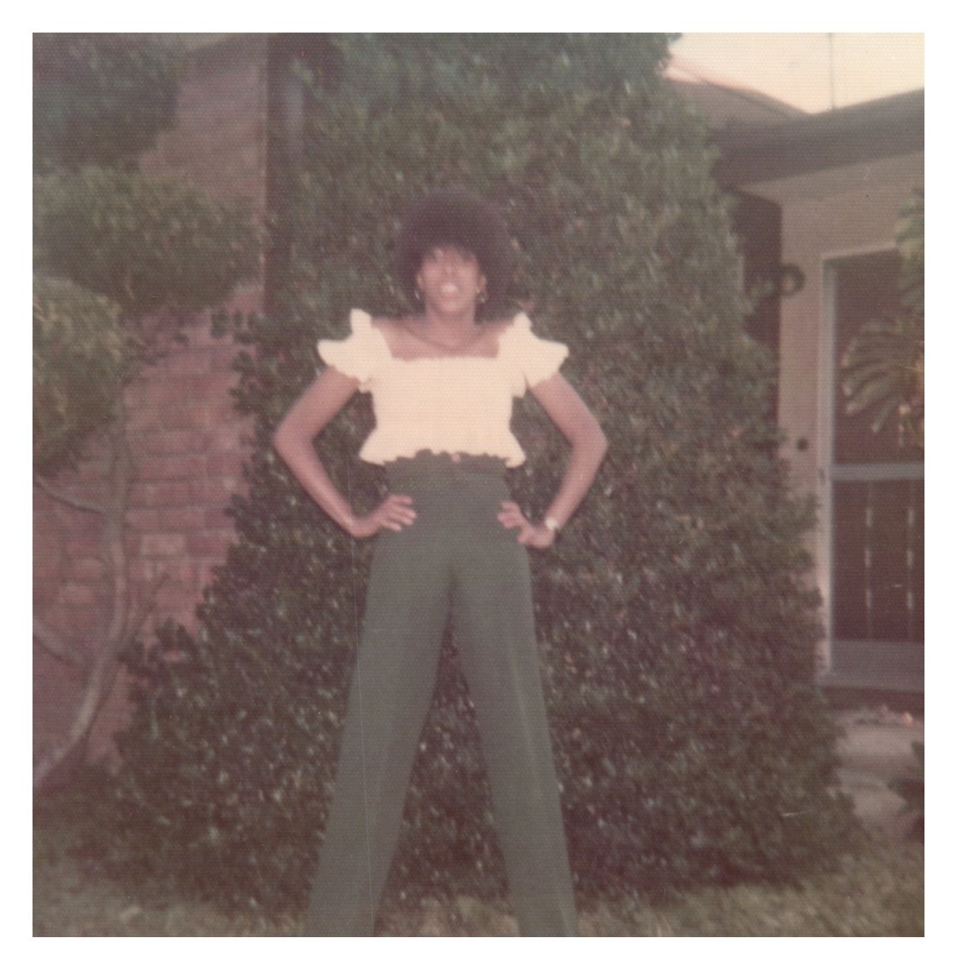 1970s African American Woman Afro High Waisted Pants Yard Snapshot Vintage Photo