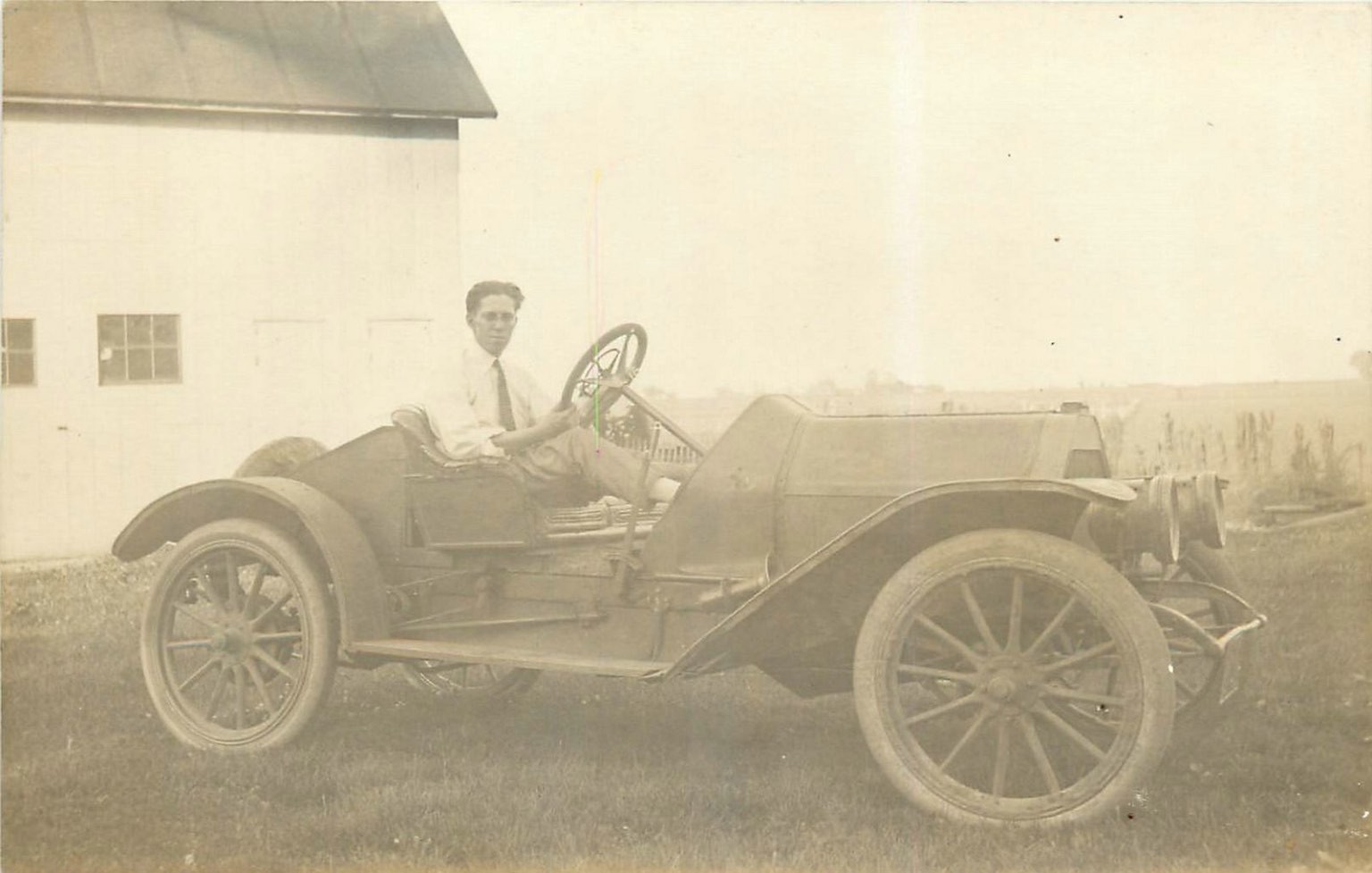 c1910 RPPC Young Man in Early Antique Car Benson IL Real Photo Postcard
