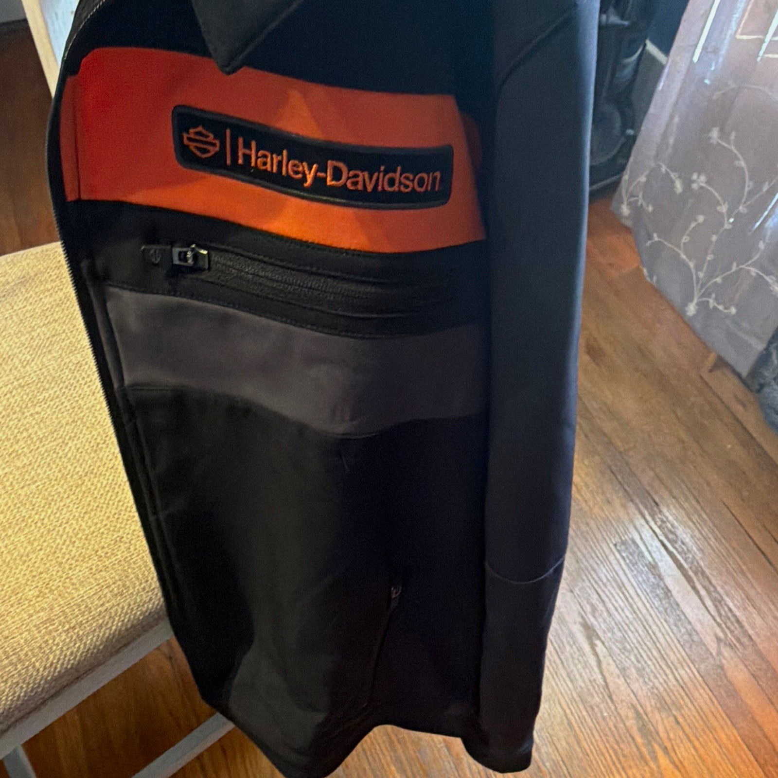 Harley-Davidson Black/Orange Jacket with Orange Logo Stripe, Made in China Harley-Davidson Black/Orange Jacket with Orange Logo Stripe, Made in China