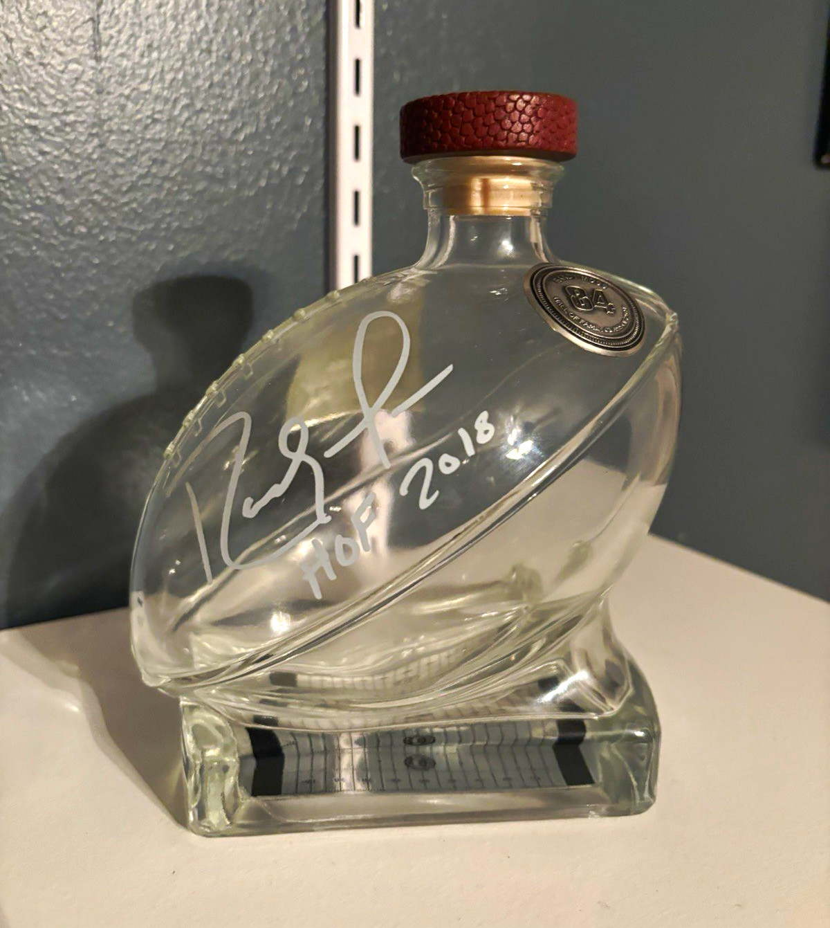 Randy Moss Clear Glass Liquor Bottle w/ Stopper, “84” Medallion, Signed, 50