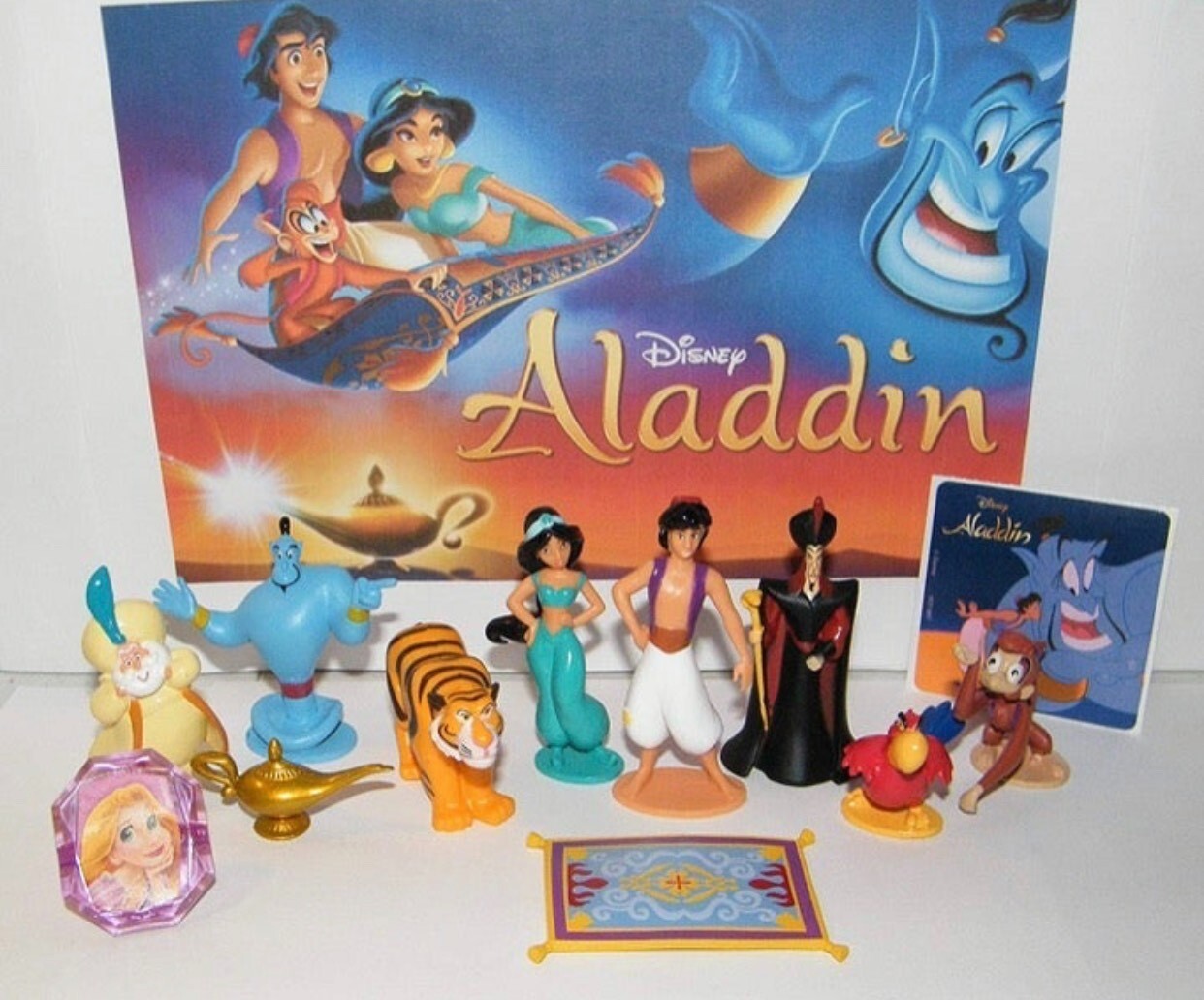 Disney Aladdin Deluxe Figure Set of 12 with Bonus Ring and Sticker