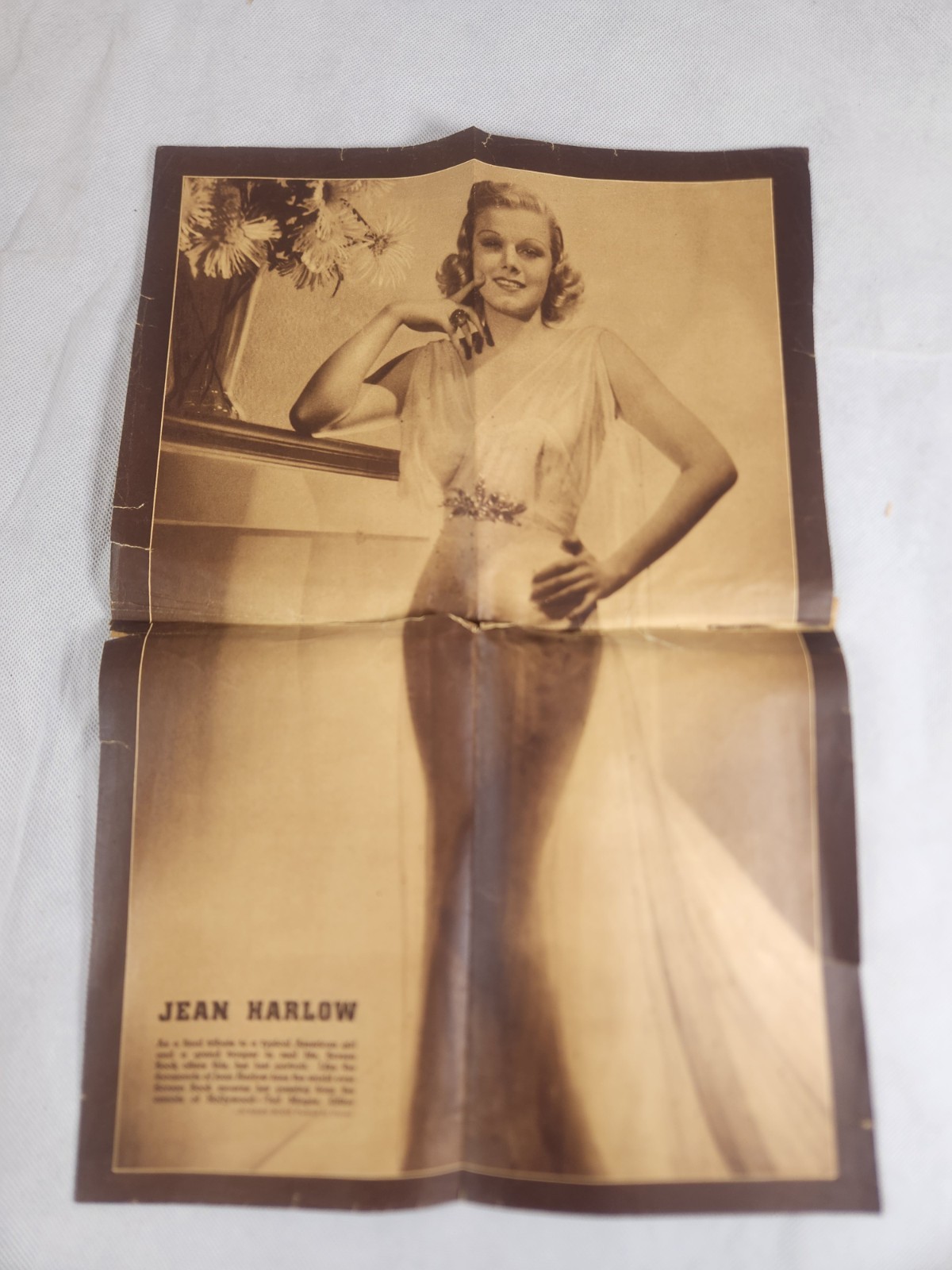 actress Jean Harlow wearing her iconic gown from the 1933 film Dinner at Eight.