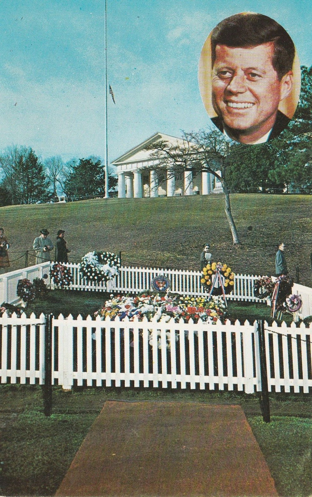 John F Kennedy Gravesite With Photo White Fence Flowers Souvenir Postcard John F Kennedy Gravesite With Photo White Fence Flowers Souvenir Postcard
