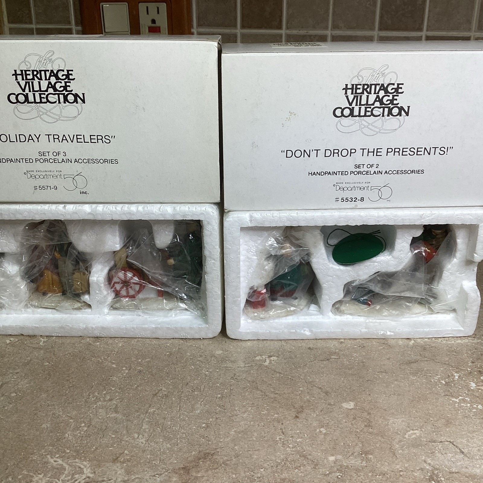 Department 56- Holiday Travelers Set of 3 + Don’t Drop The Presents- NEW
