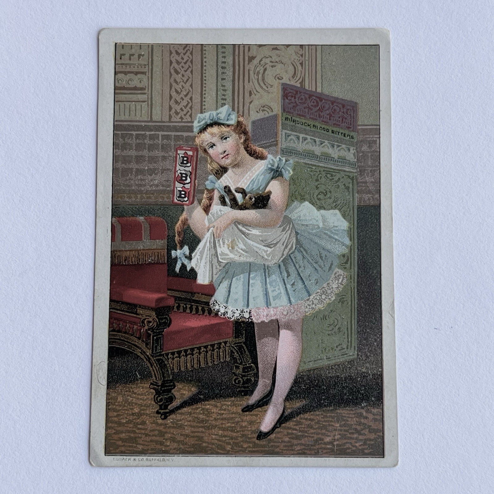 Antique Trade Card Girl With Cat Burdock Blood Bitter Druggist Auburn NY