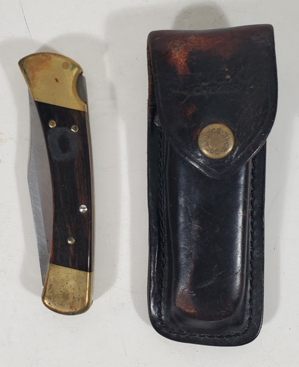 Vintage Buck 110 Folding Hunter Lockback Knife 2011 Date Code USA Brass Ebony