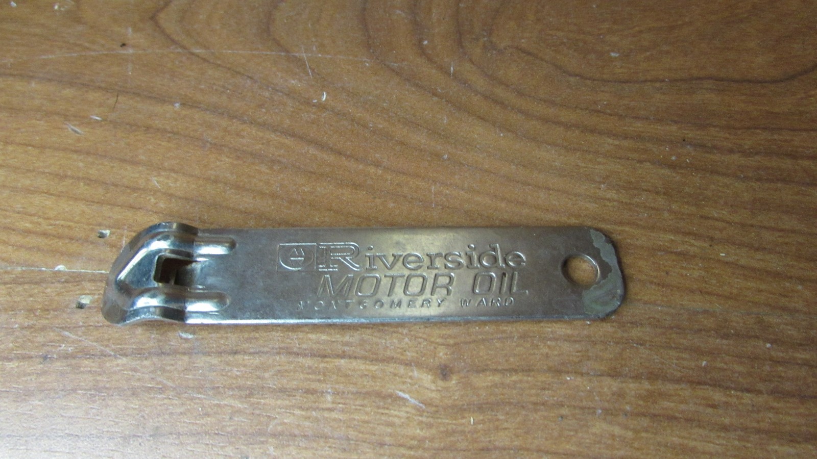 Rare vintage Riverside Motor Oil Montgomery Ward church key can opener