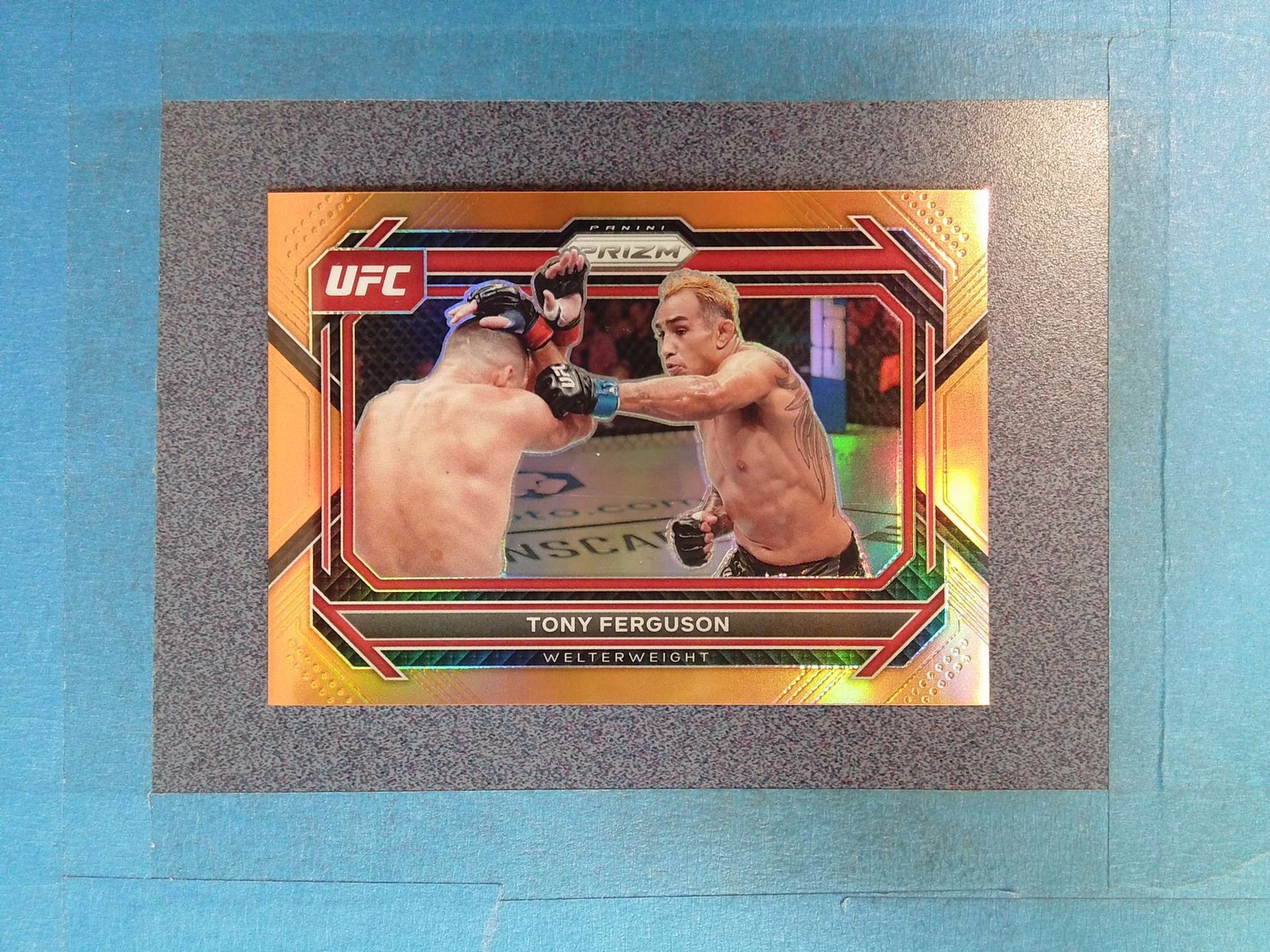 FB43) 2023 Prizm TONY FERGUSON 51/99 Orange Welterweight