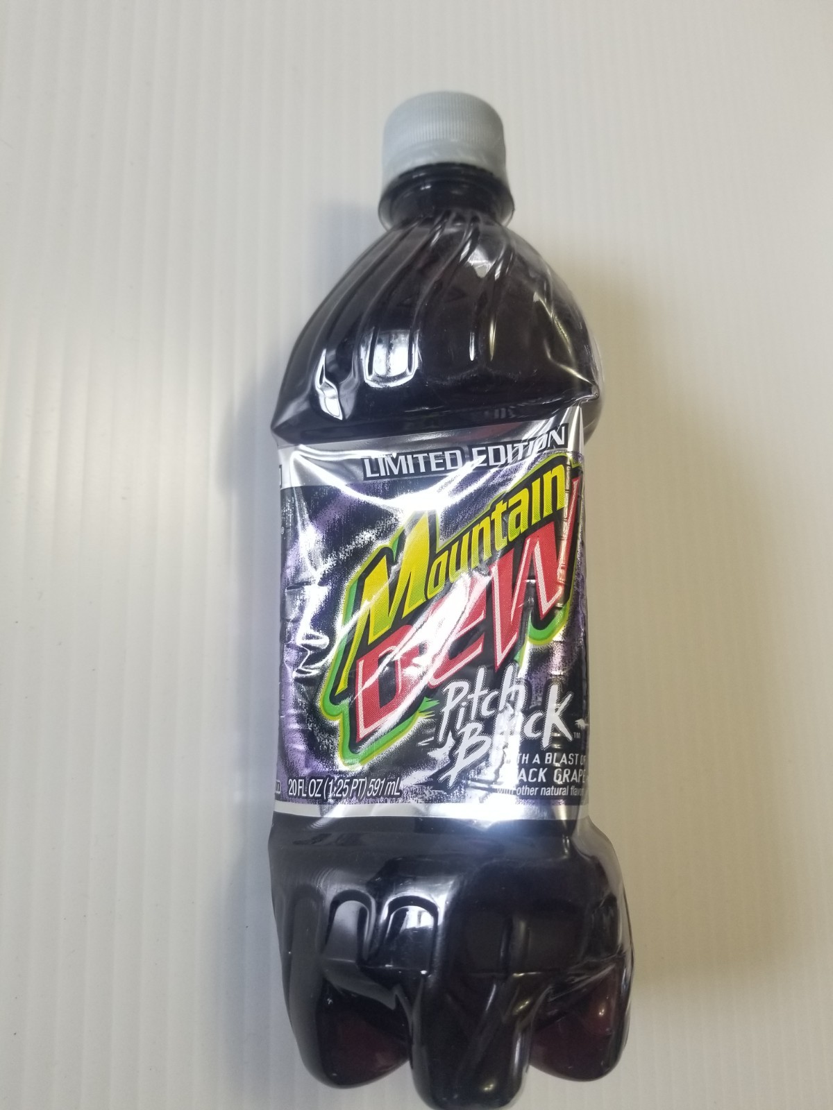 MOUNTAIN DEW PITCH BLACK 2004 Sealed Never Opened 20 oz Plastic Bottle NOS 