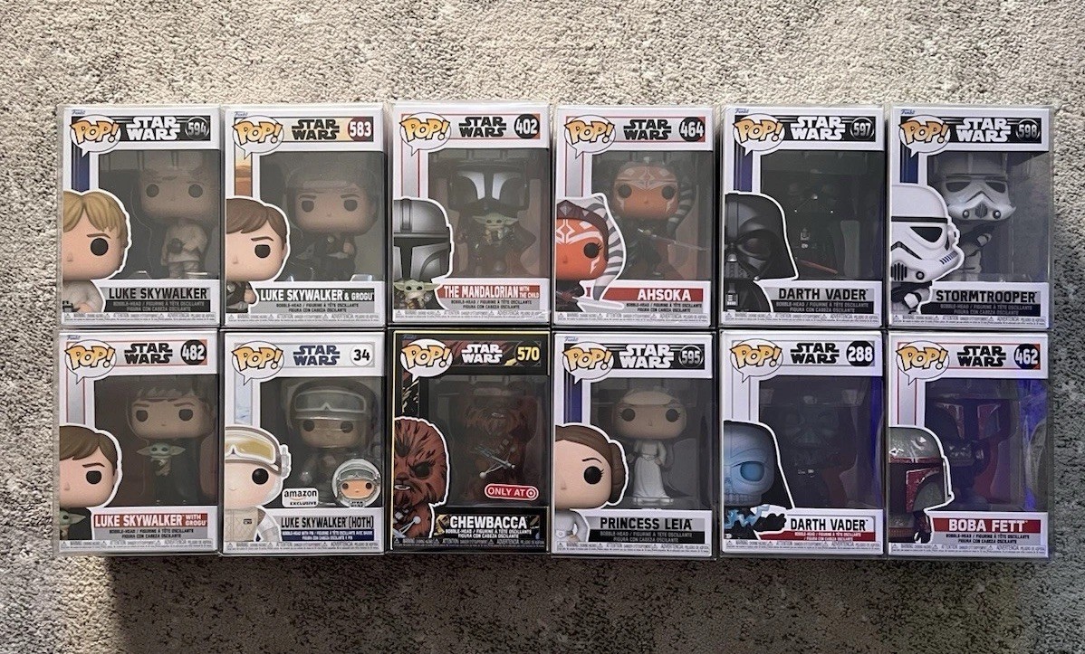 Starwars Funko Pop Collection Lot 12 in case protectors 