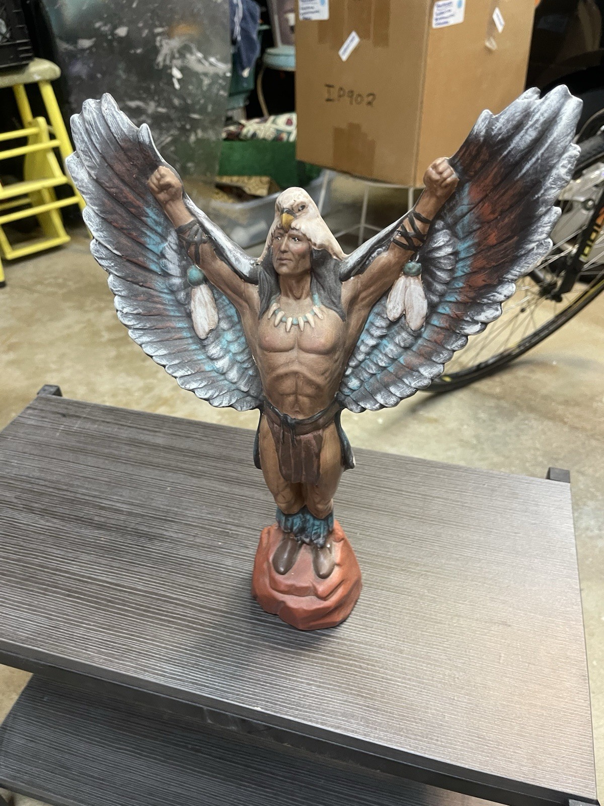 vintage hand-painted ceramic figurine of a Native American eagle dancer