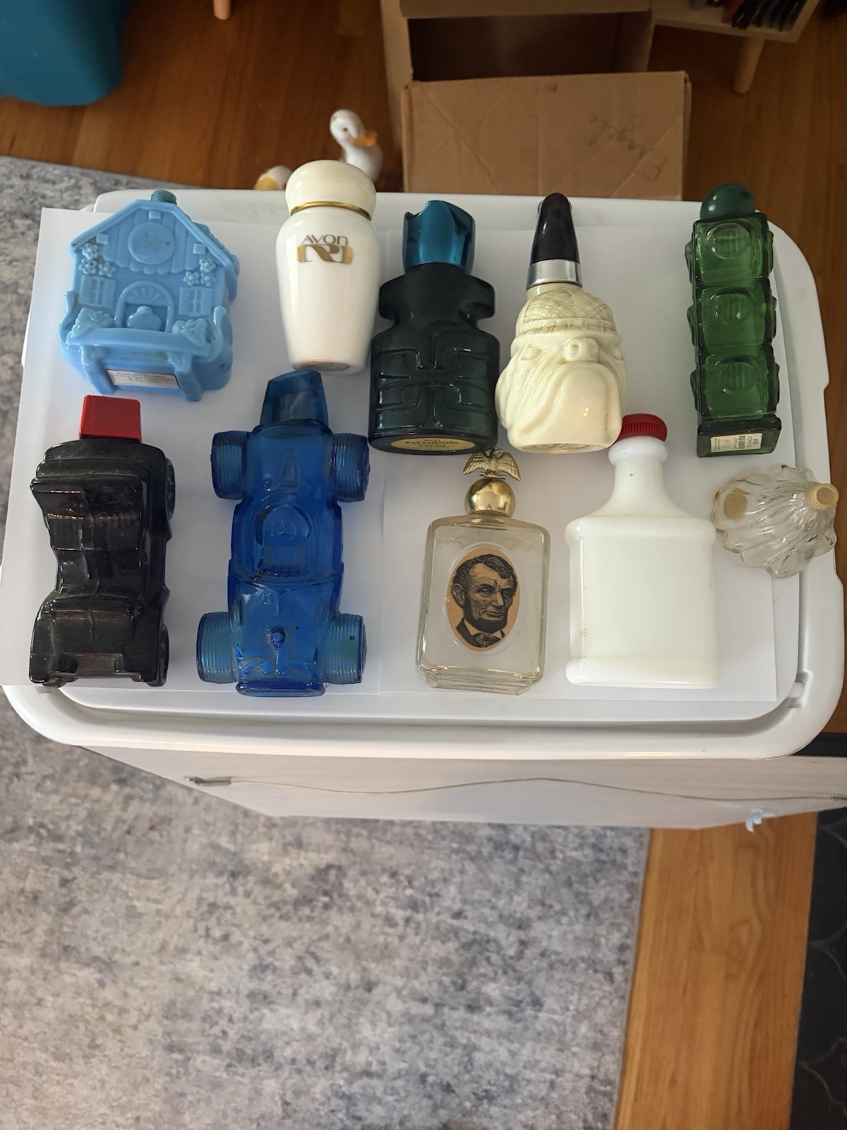 Collection of 10 vintage Avon novelty and figural decanter bottles