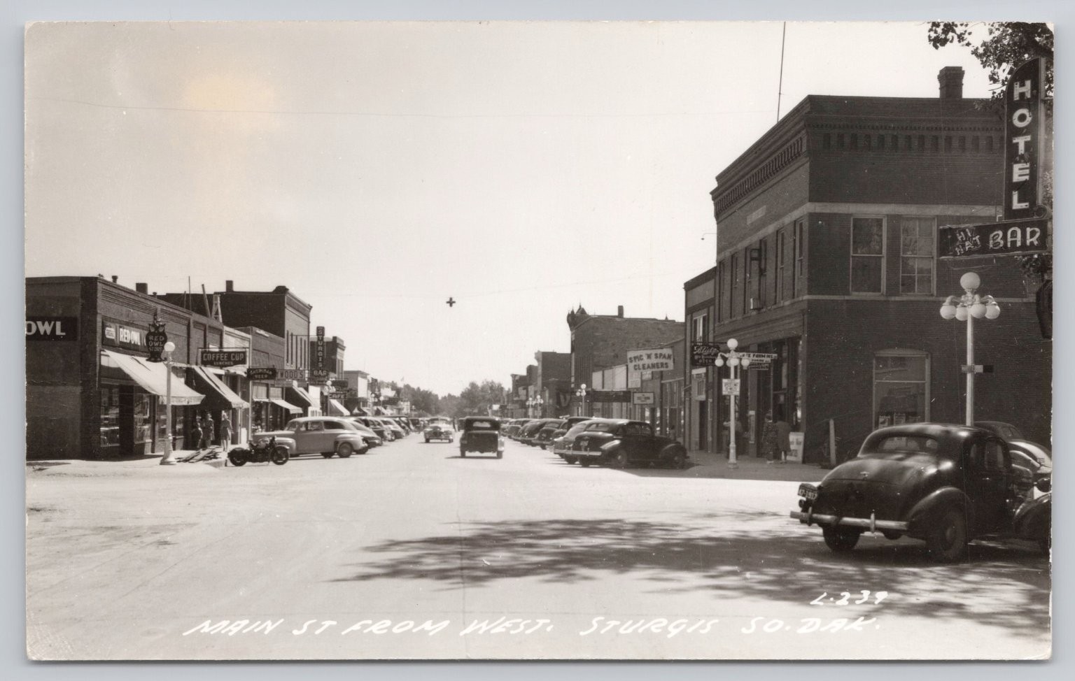 Sturgis South Dakota Main Street RPPC Vintage Cars L. L. Cook Co. Postcard Sturgis South Dakota Main Street RPPC Vintage Cars L. L. Cook Co. Postcard