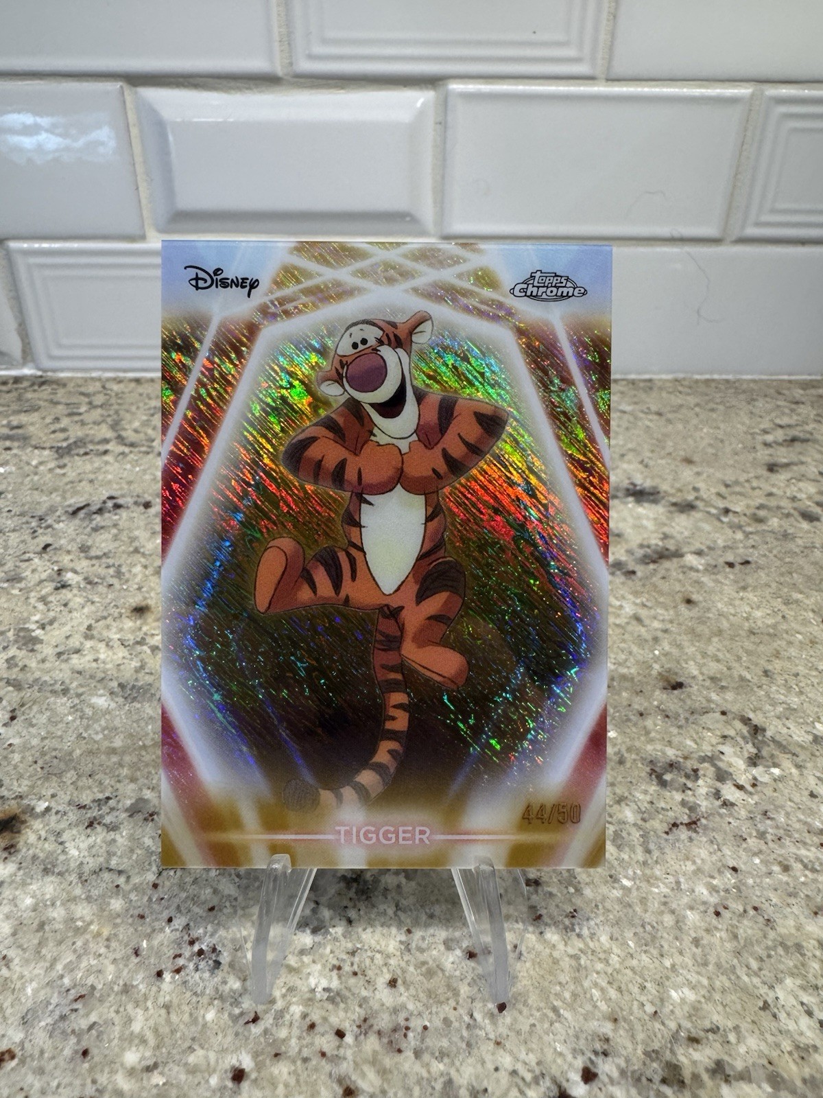 2026 Topps Disney Neon Tigger Chrome Neon Etch Gold Shimmer CNE-7 #44/50 Card 2026 Topps Disney Neon Tigger Chrome Neon Etch Gold Shimmer CNE-7 #44/50 Card