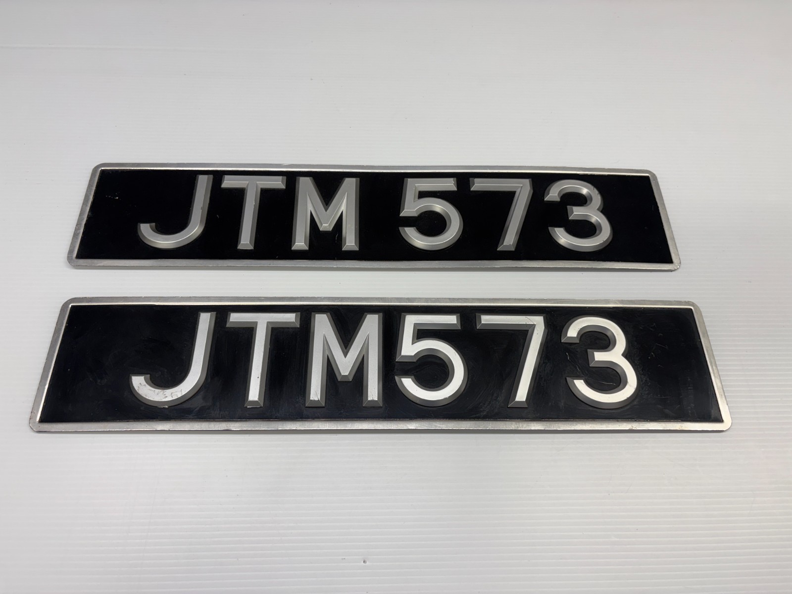 Pair of Vintage 1950s British License Plates - JTM 573