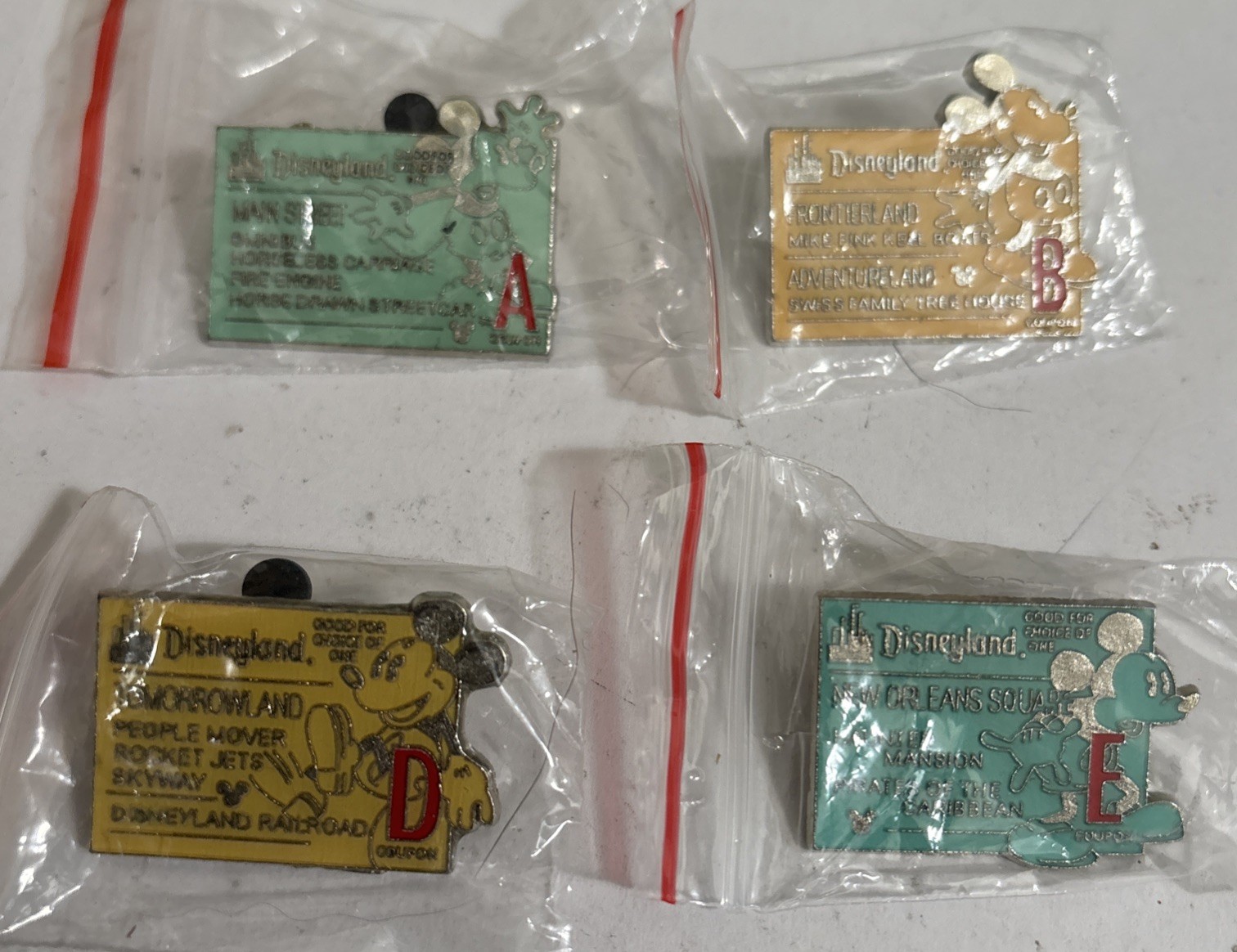 Disney PARK RIDE DISNEYLAND TICKETS Pin lot Of 4