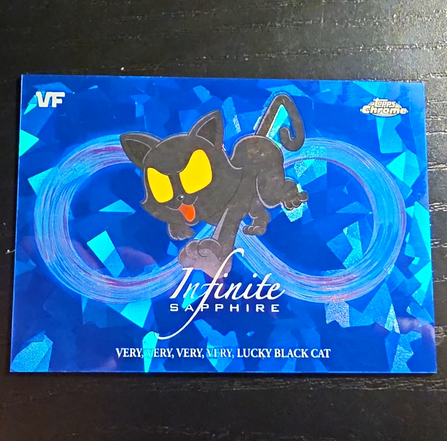 Topps 2026 Topps Chrome VeeFriends Infinite Sapphire IS-5 Lucky Black Cat Insert Topps 2026 Topps Chrome VeeFriends Infinite Sapphire IS-5 Lucky Black Cat Insert