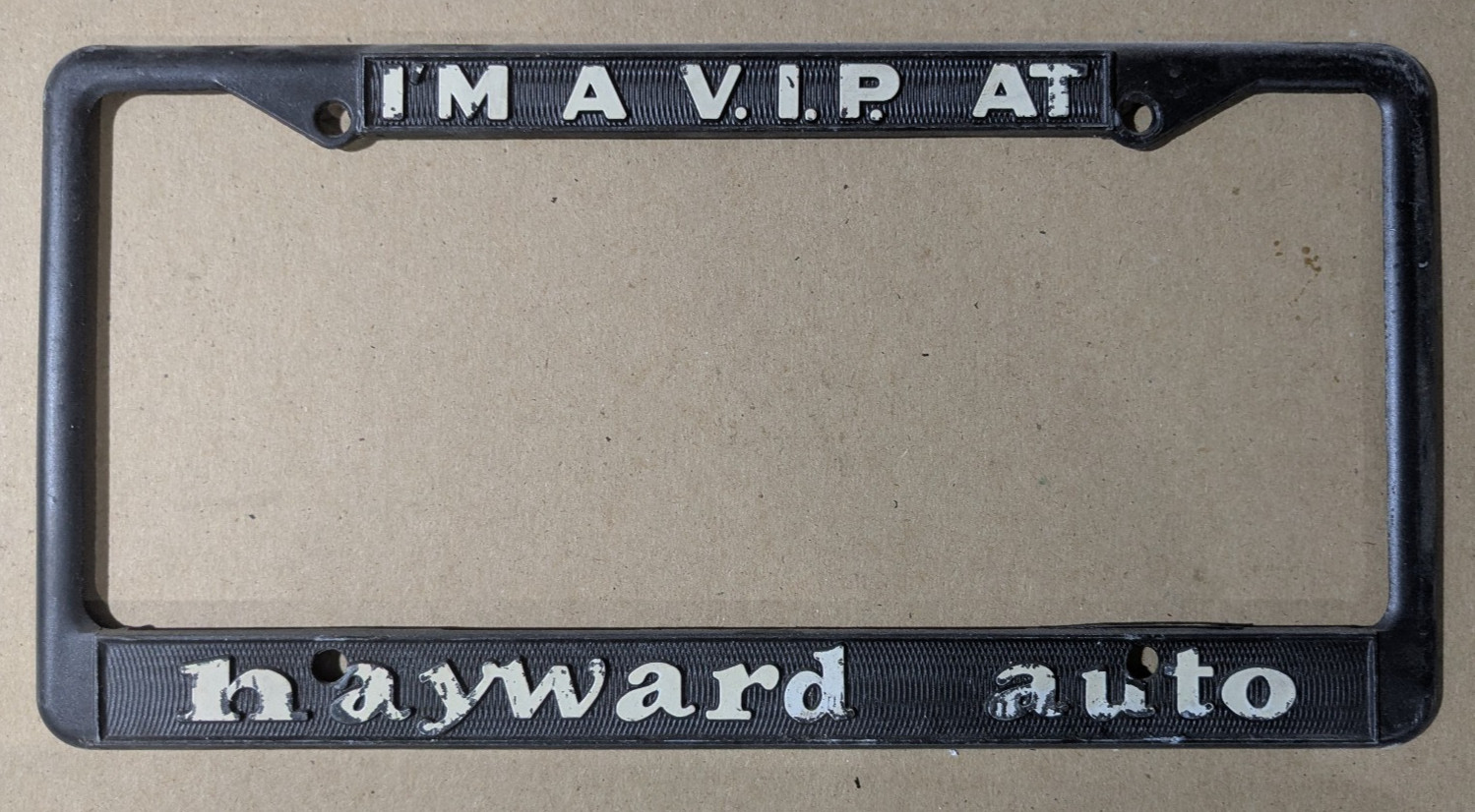 VTG Black Metal I'm A V.I.P. At Hayward Auto Novelty Advert License Plate Frame