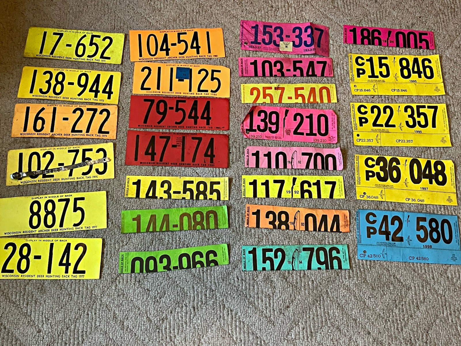 Lot of 21 Wisconsin Deer Hunting Back Tags (archery, firearm, CP)