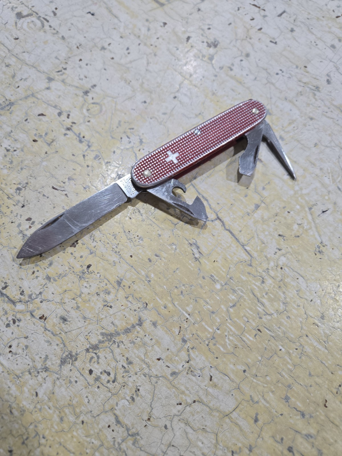 Victorinox Pioneer Alox Swiss Army Knife with red checkered Victorinox Pioneer Alox Swiss Army Knife with red checkered