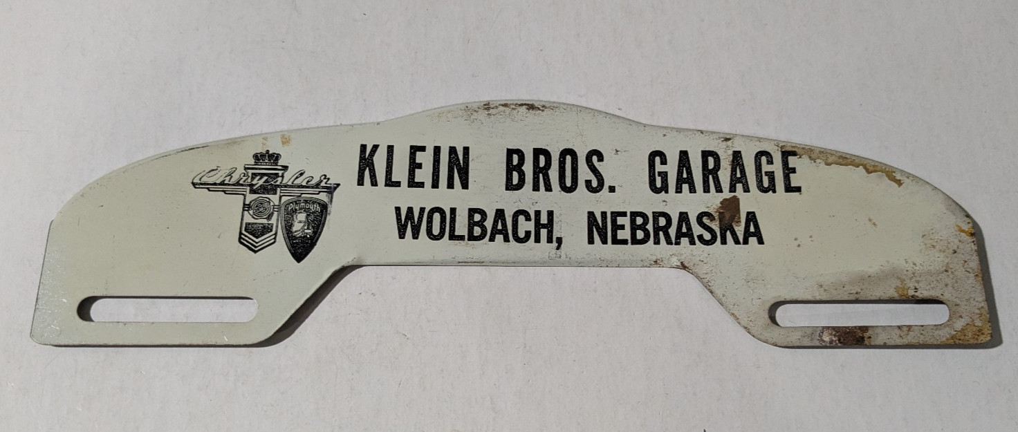 Vintage Metal Chrysler Klein Bros Garage Wolbach Nebraska License Plate Topper