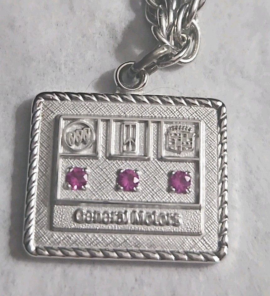 General Motors GM 1/10 10K White Gold  Ruby Service Charm Bracelet 