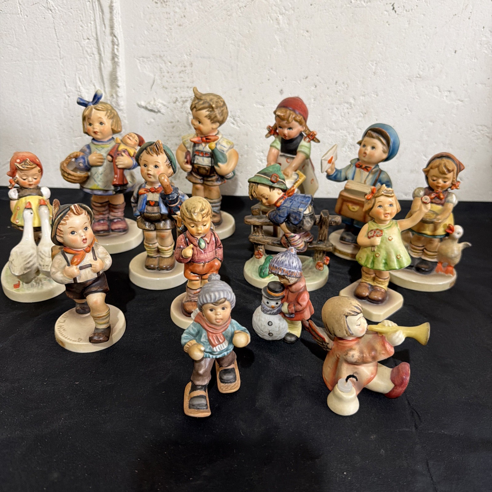 Goebel Hummel porcelain figurines depicting children in traditional German Lo 14