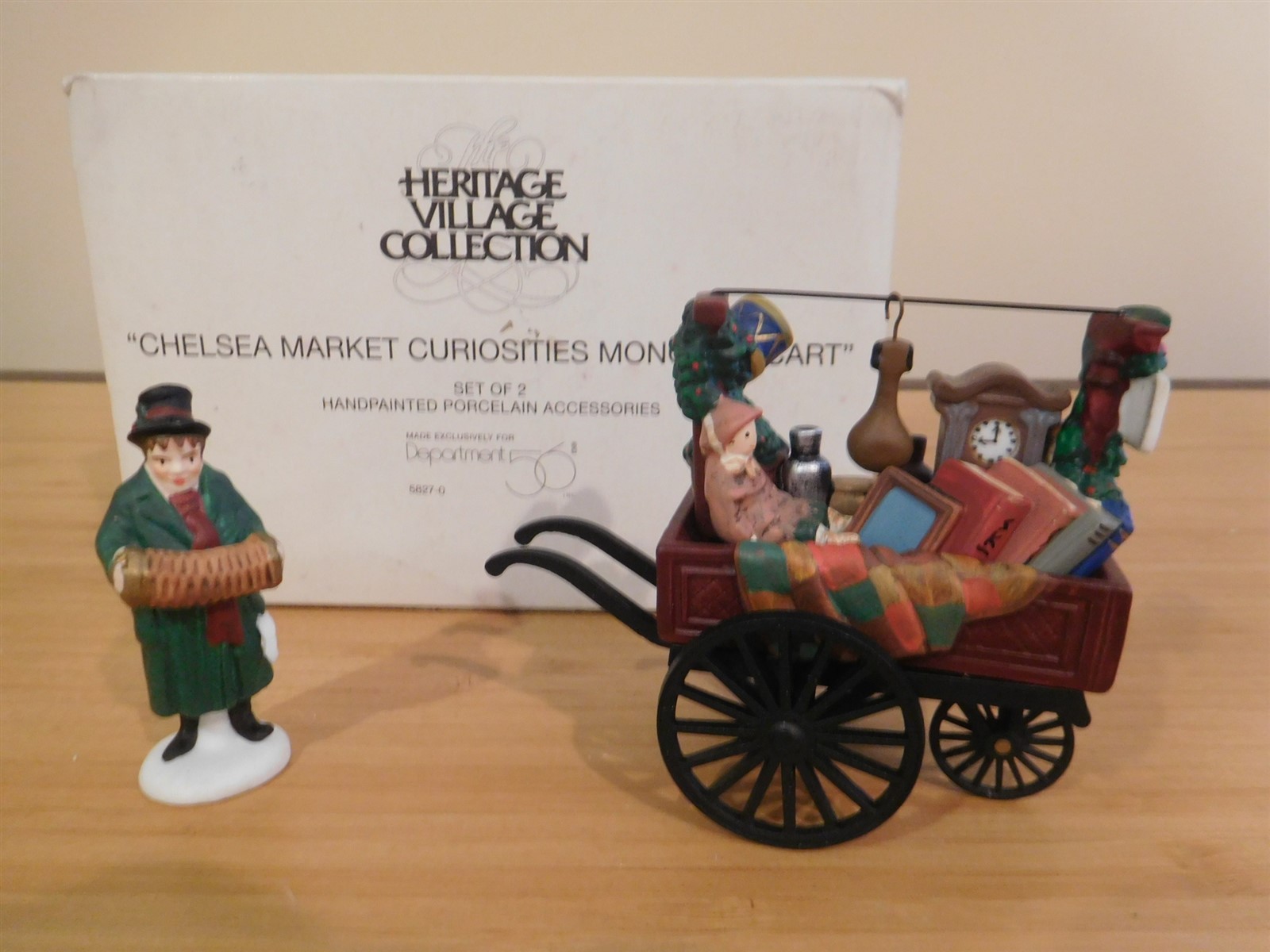 Dept 56 Dickens Village - Chelsea Market Curiosities Monger & Cart - Set of 2