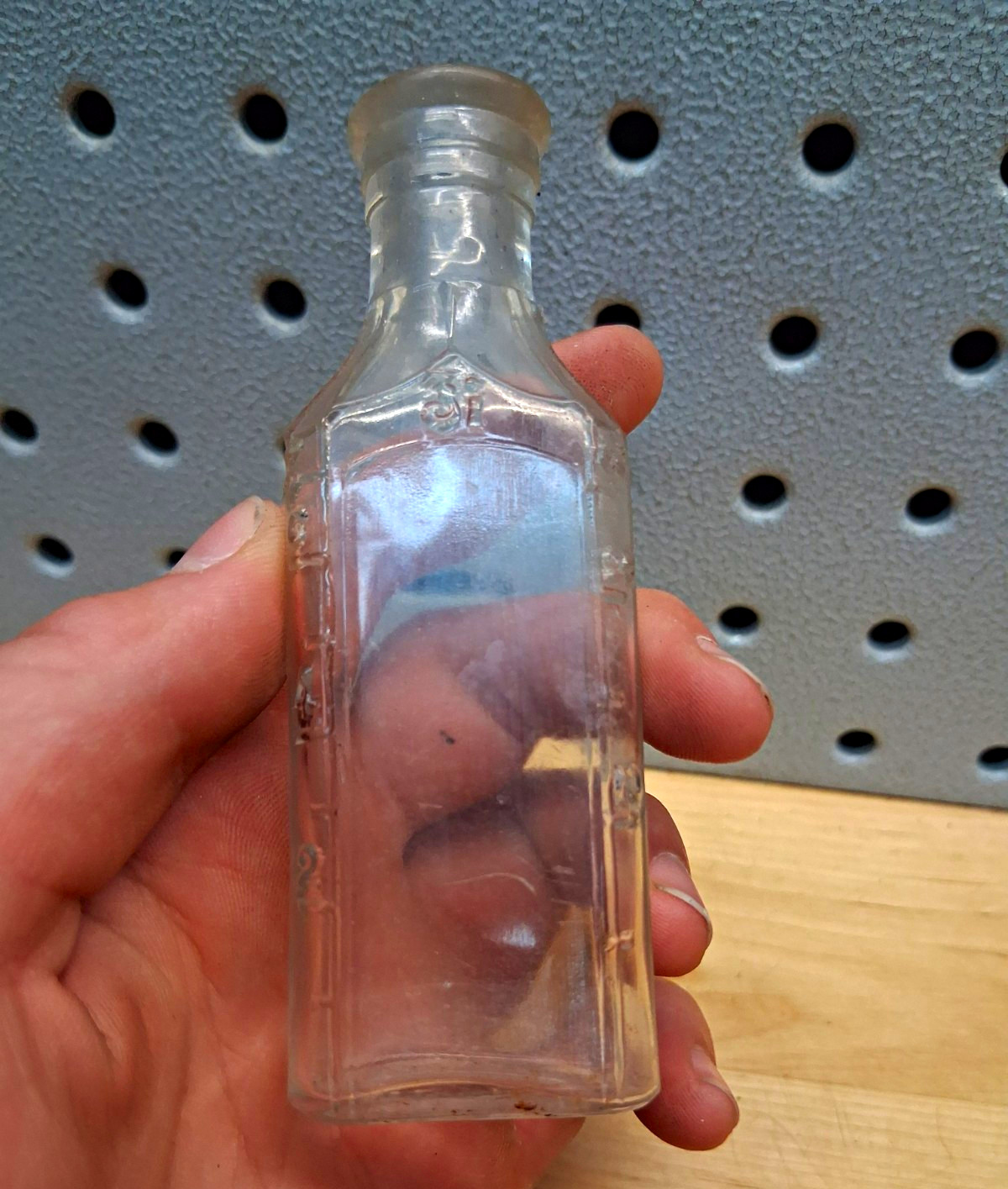Small Clear Glass Medicine Bottle, Rectangular, Embossed Base